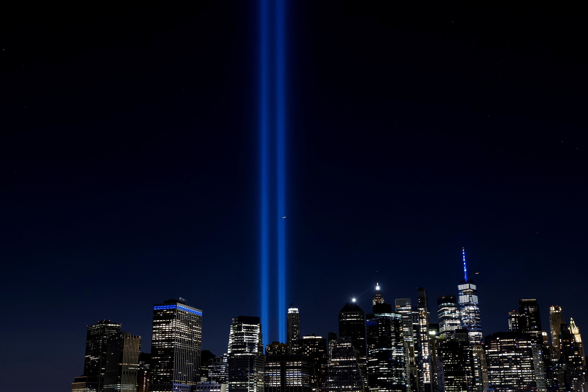 <p>The Tribute in Light art installation is seen from the New York City skyline on September 11, 2021. </p>
