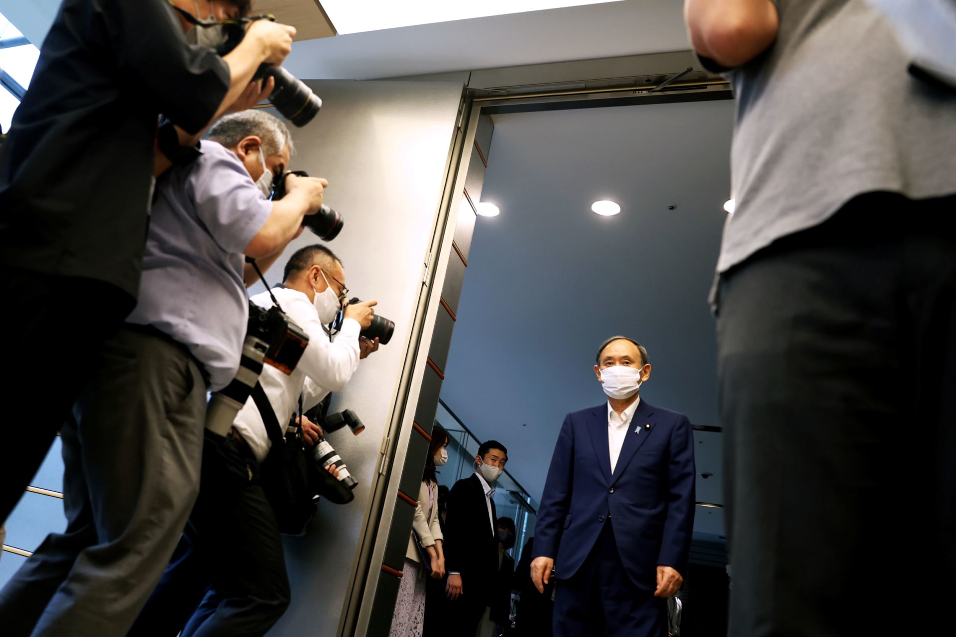 <p>Prime Minister Yoshihide Suga arrives to meet with president of the International Paralympic Committee (IPC) Andrew Parsons in Tokyo, September 3, 2021, following his announcement that he will not seek re-election for Liberal Democratic Party leadership.</p>
