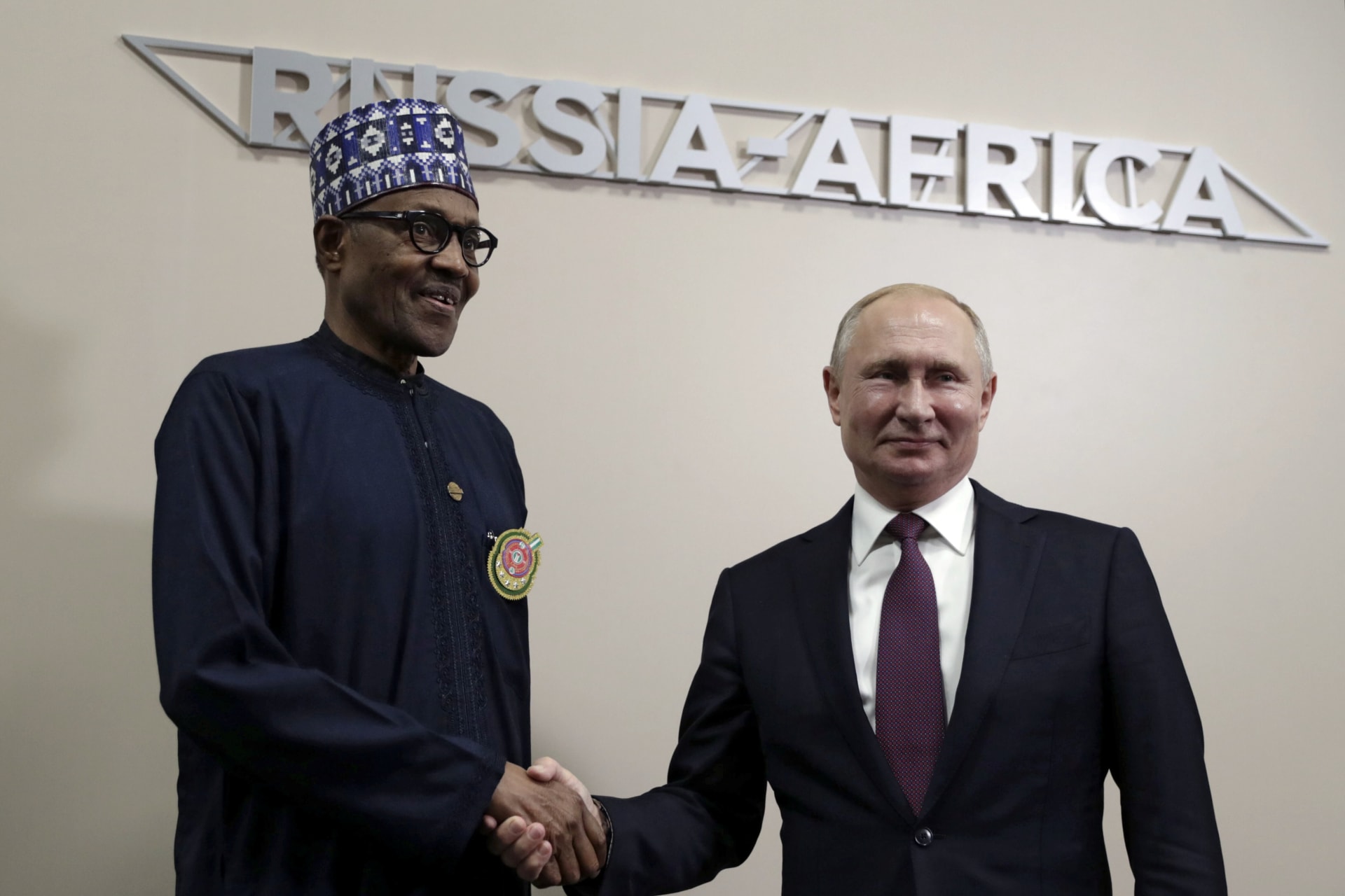 <p>Russia’s President Vladimir Putin shakes hands with Nigeria’s President Muhammadu Buhari during a meeting on the sidelines of the Russia–Africa Summit in Sochi, Russia on October 23, 2019.</p>

