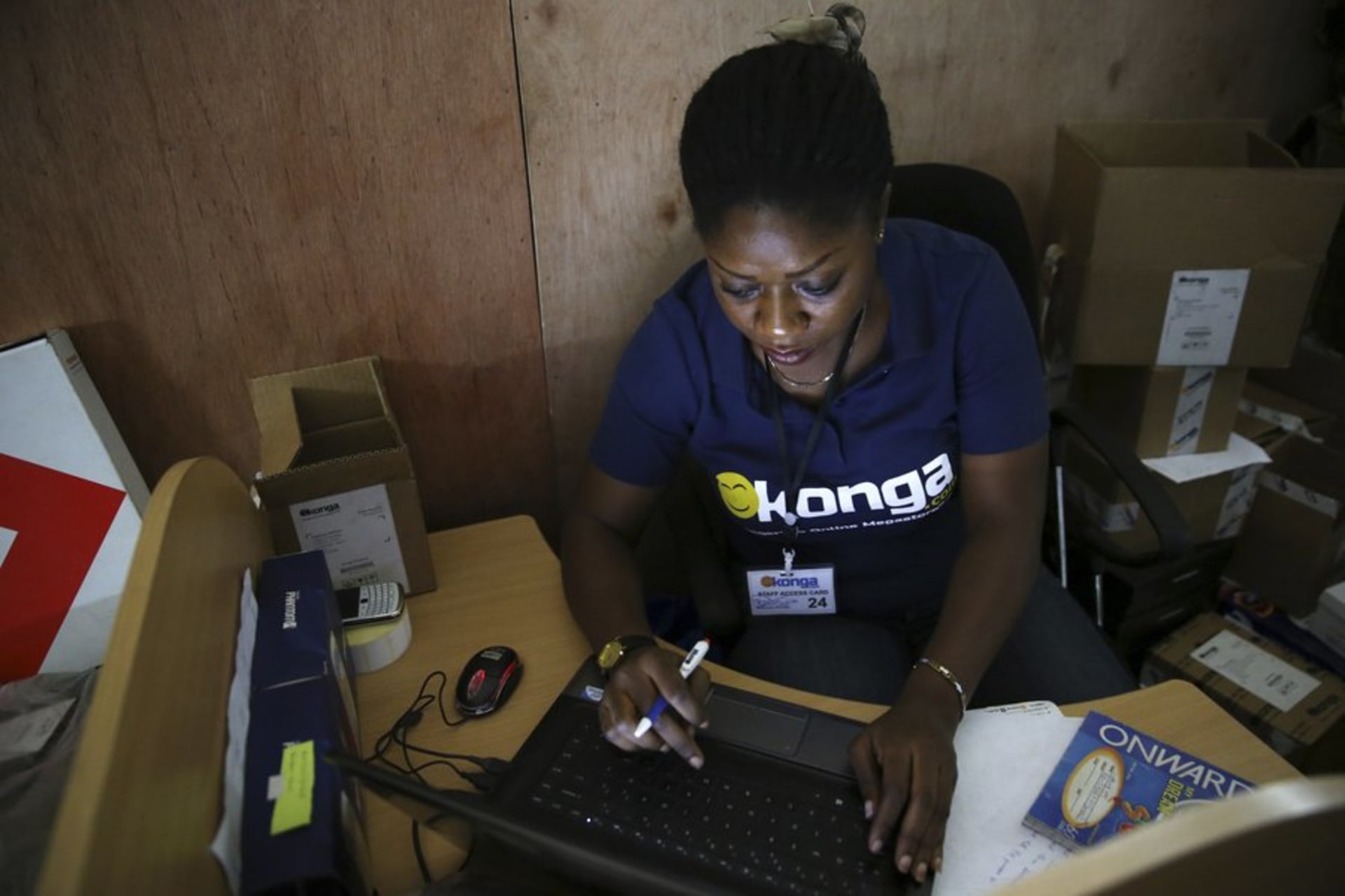 <p>A woman inputs data into a computer at the Konga online shopping company warehouse in Lagos. </p>
