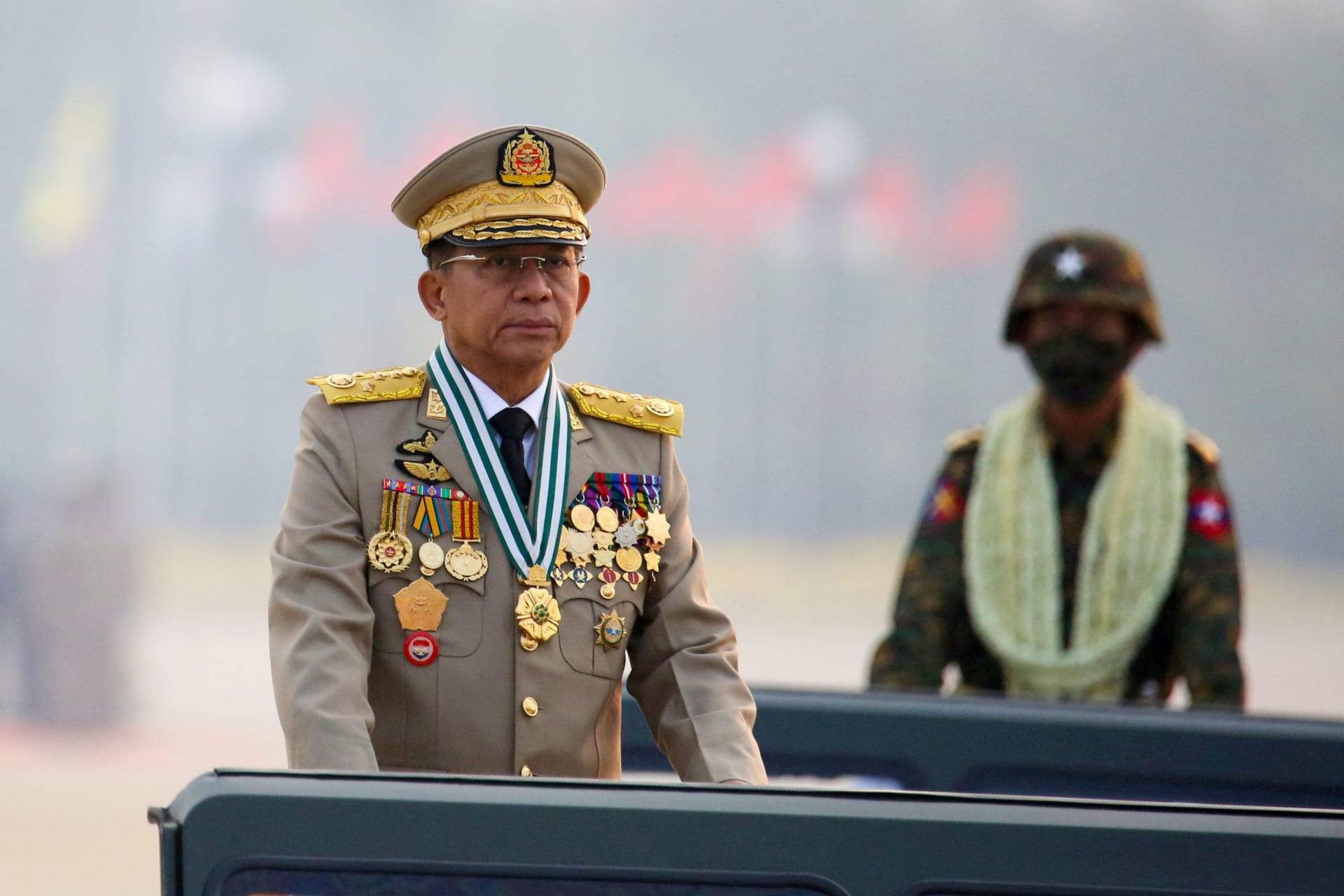 <p>Myanmar’s military ruler Min Aung Hlaing presides over an army parade on Armed Forces Day in Naypyitaw, Myanmar, on March 27, 2021.</p>
