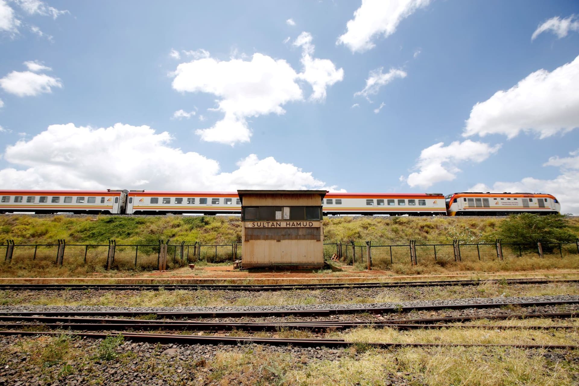<p>An SGR passenger train travels past the town of Sultan Hamud, Kenya on February 13, 2019. </p>
