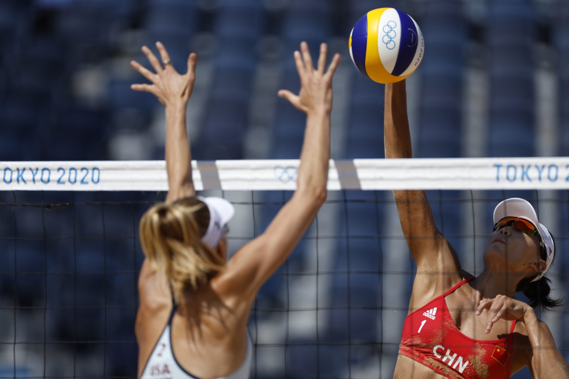 <p>Tokyo 2020 Olympics – Beach Volleyball – Women – Pool B – USA (April/Alix) v China (Xue/Wang X X) – Shiokaze Park, Tokyo, Japan – July 25, 2021. Alix Klineman of the United States with Xue Chen of China in action. </p>
