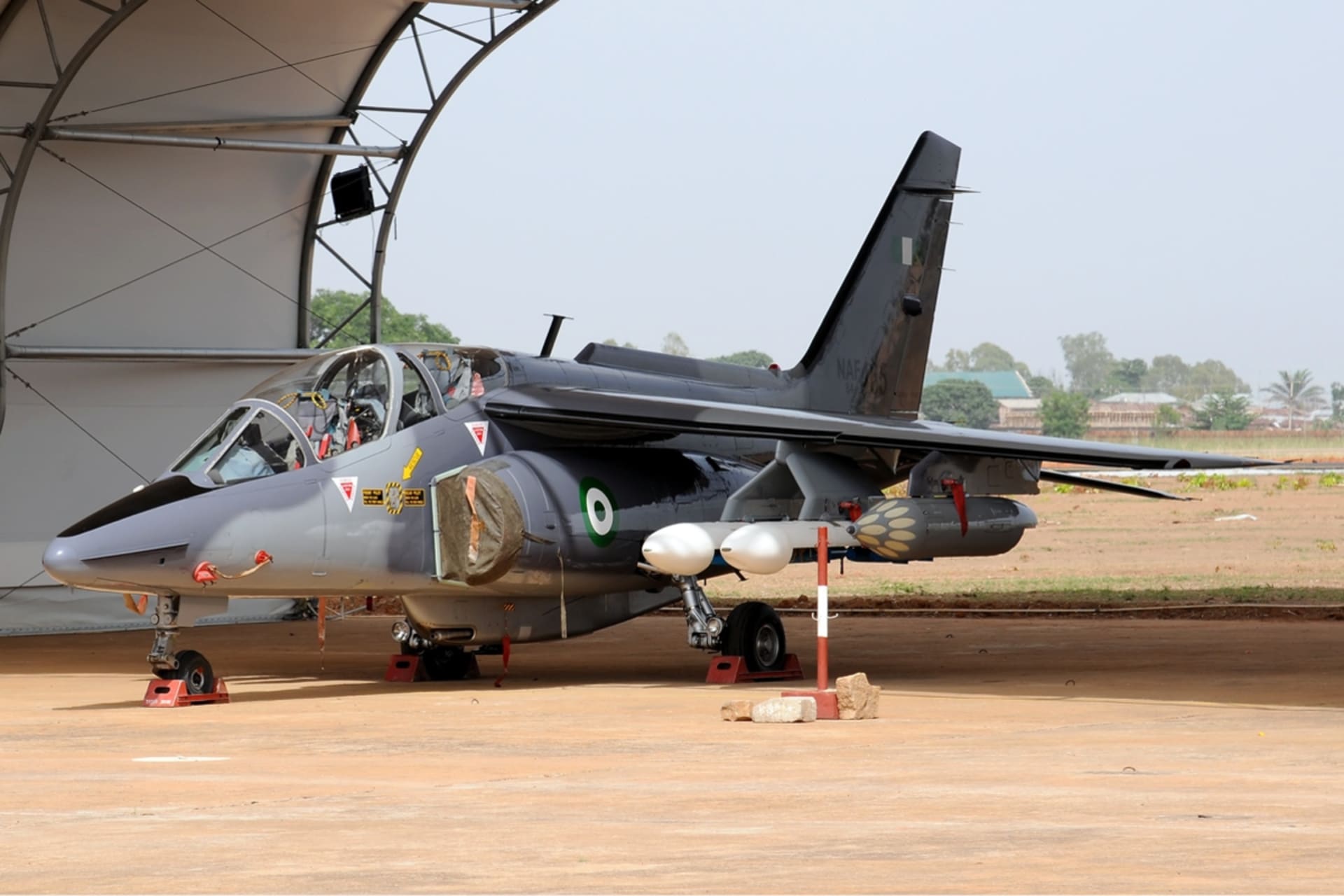 <p>A Nigerian Alpha Jet at Old Kaduna Airport in Kaduna State, Nigeria, 2012.</p>
