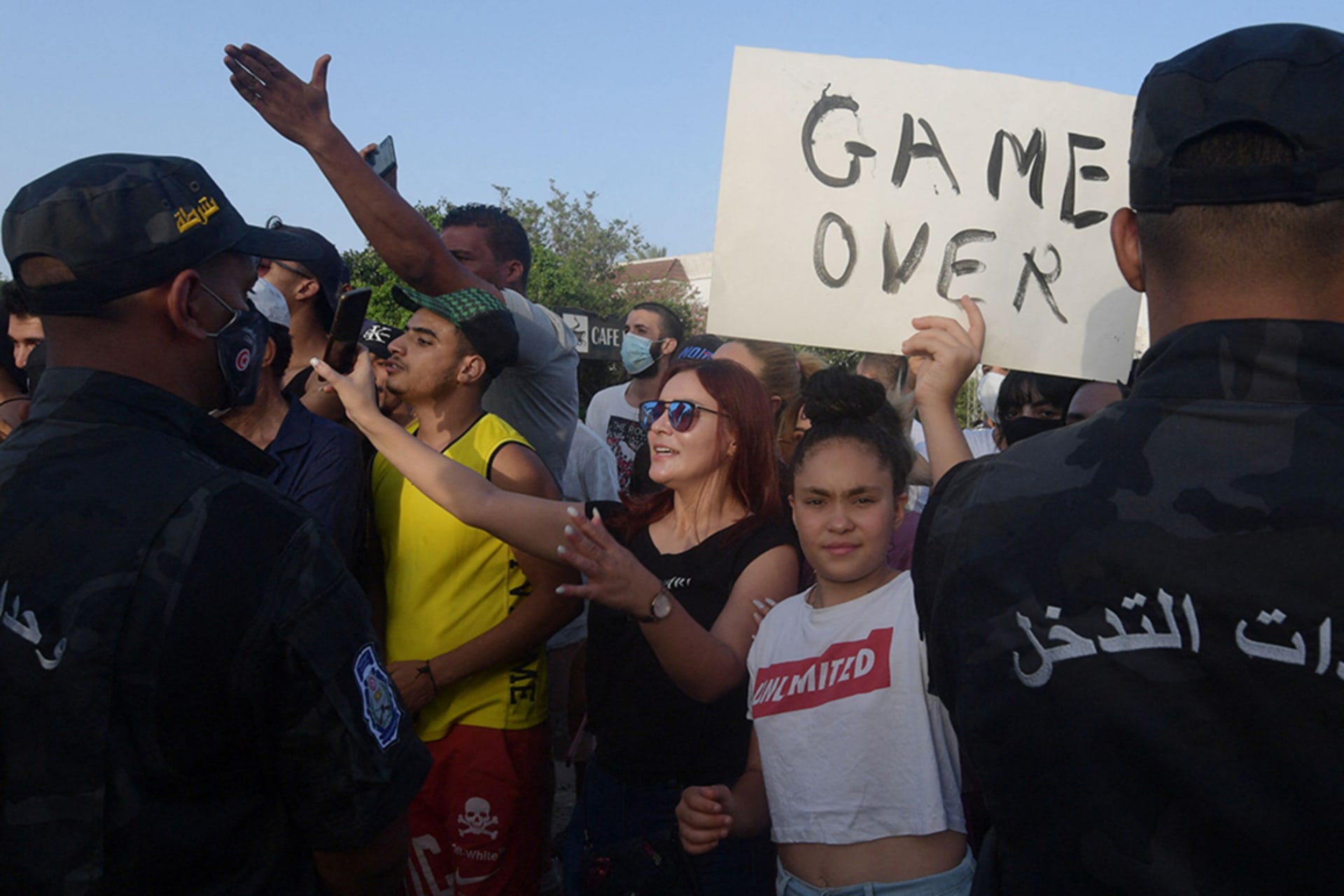<p>Supporters of Tunisian President Kais Saied chant slogans denouncing Assembly Speaker and Islamist Ennahdha party leader Rached Ghannouchi in front of parliament.</p>
