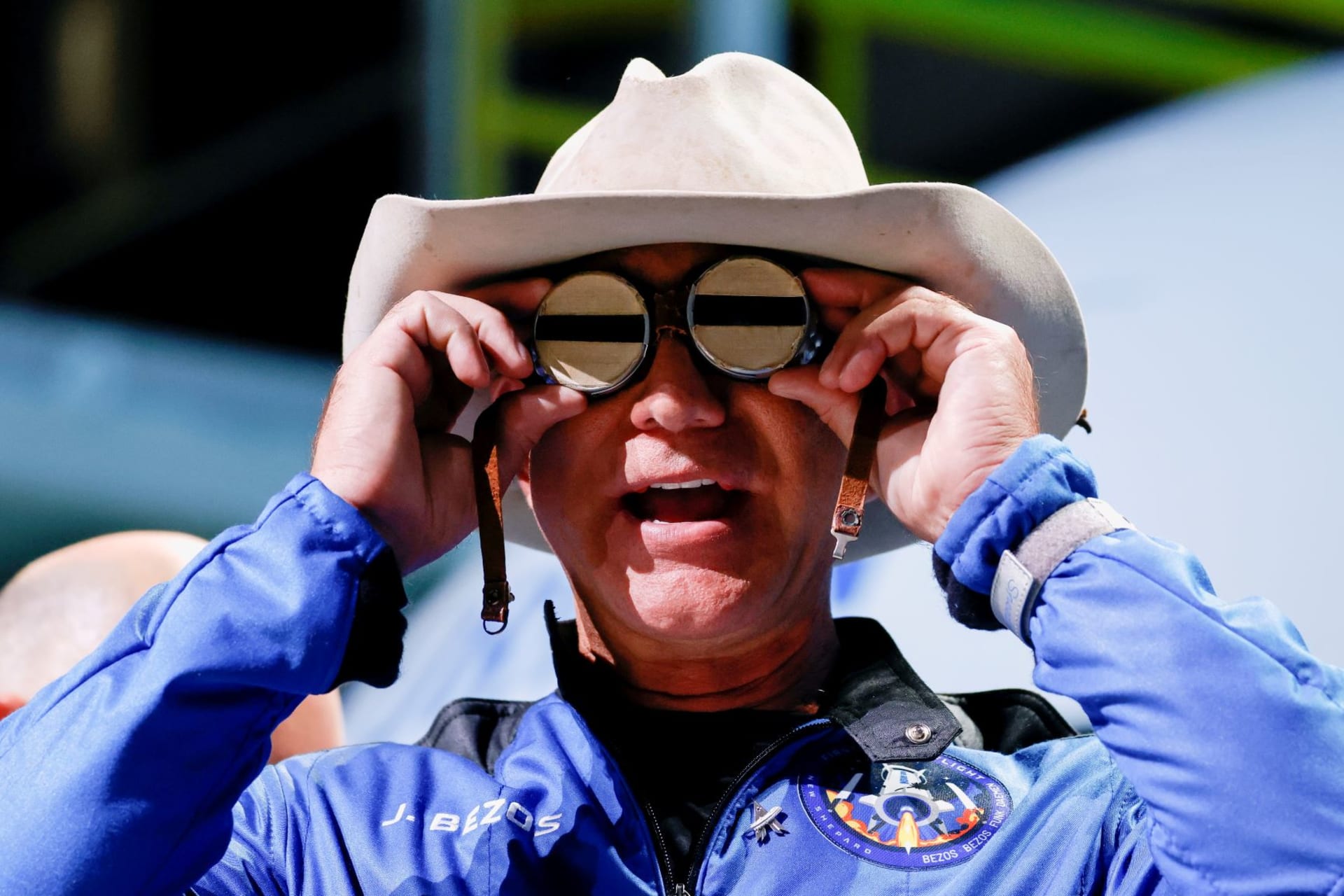 <p>Billionaire American businessman Jeff Bezos wears goggles owned by Amelia Earhart which he carried into space at a post-launch press conference after he flew on Blue Origin’s inaugural flight to the edge of space, in the nearby town of Van Horn, Texas on </p>
