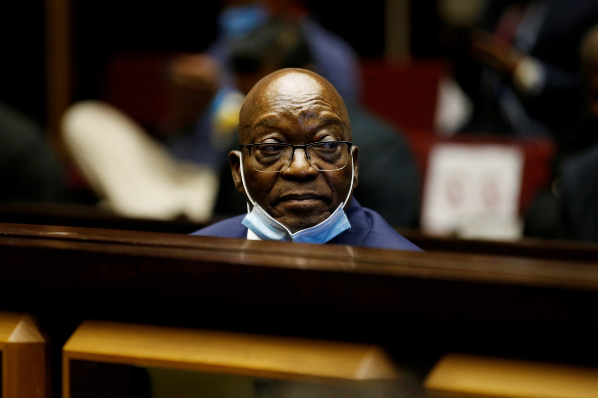 <p>Former South African President Jacob Zuma sits in the dock after recess in his corruption trial in Pietermaritzburg, South Africa on May 26, 2021.</p>
