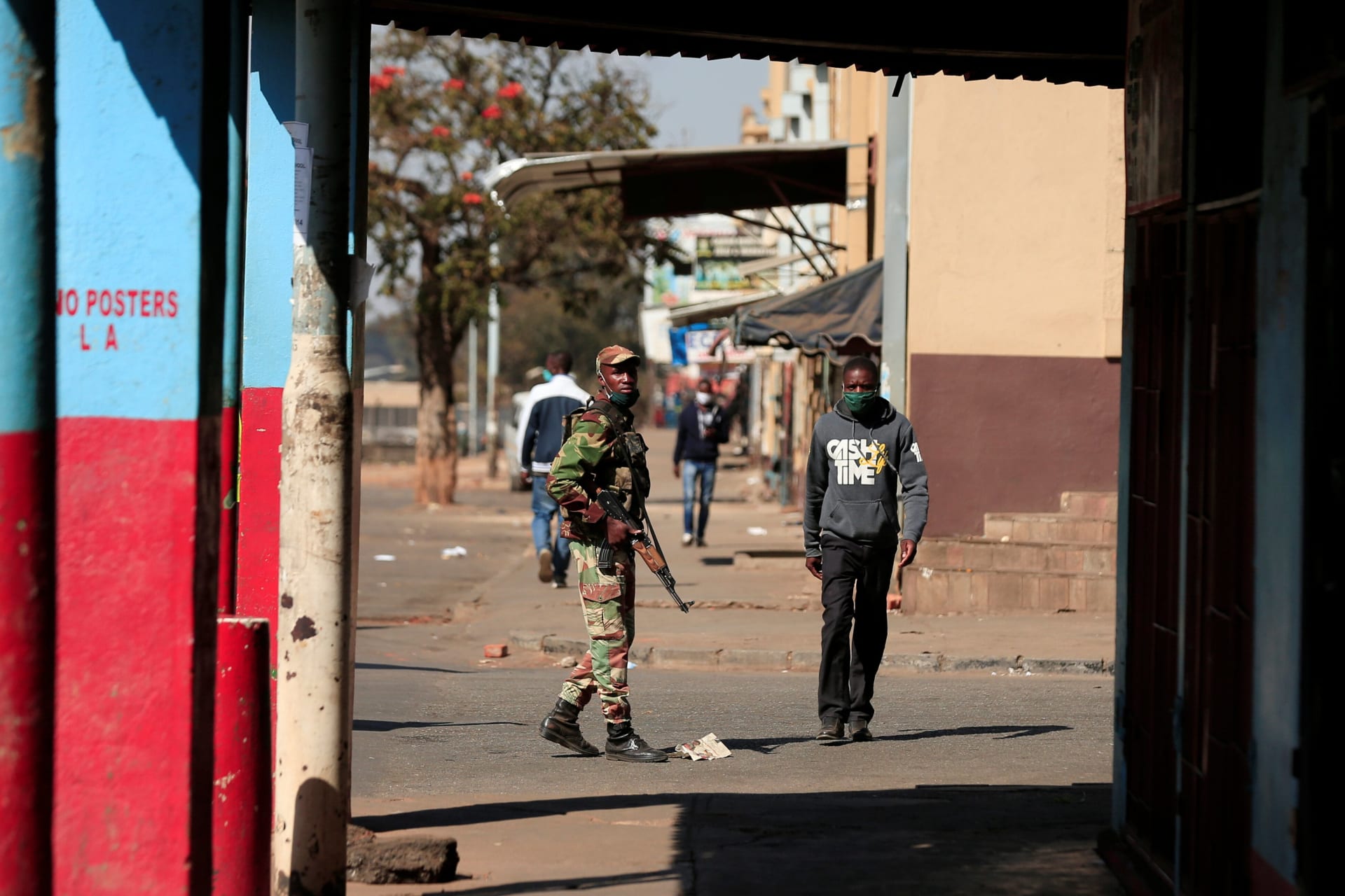 <p>A soldier patrols the streets ahead of planned anti-government protests during a COVID-19 outbreak in Harare, Zimbabwe on July 30, 2020.</p>
