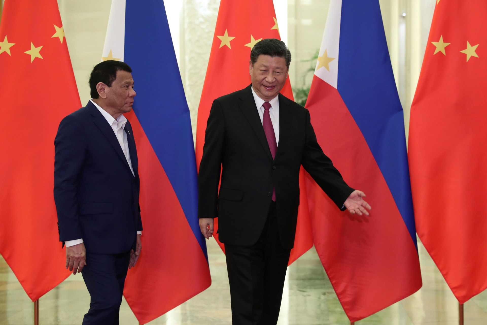 <p>Philippine President Rodrigo Duterte and Chinese President Xi Jinping walk to a meeting at the Great Hall of People in Beijing, China, on on April 25, 2019.</p>
