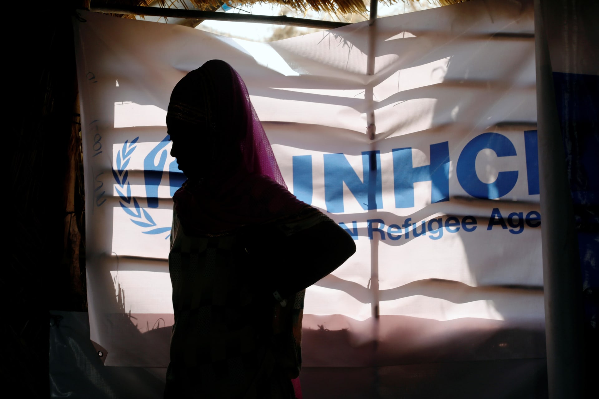 <p>An Ethiopian refugee stands as she is registered by the United Nations High Commissioner for Refugees (UNHCR) at the Um Rakuba refugee camp on the Sudan-Ethiopia border, Sudan, November 28, 2020.</p>
