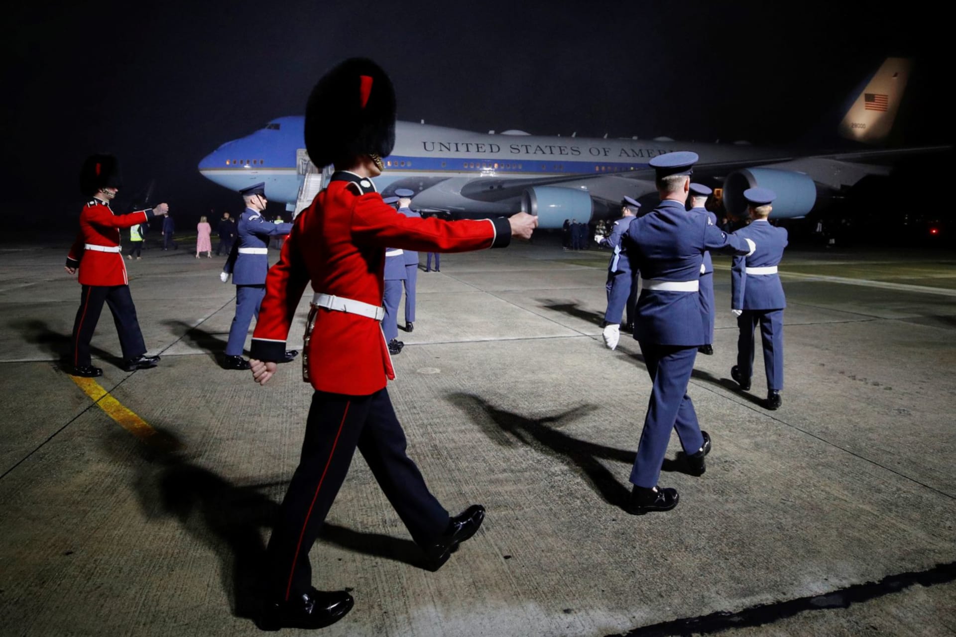 <p>Military personnel march to welcome U.S. President Joe Biden and first lady Jill Biden upon the arrival of Air Force One at Cornwall Airport in Britain on June 9, 2021. </p>
