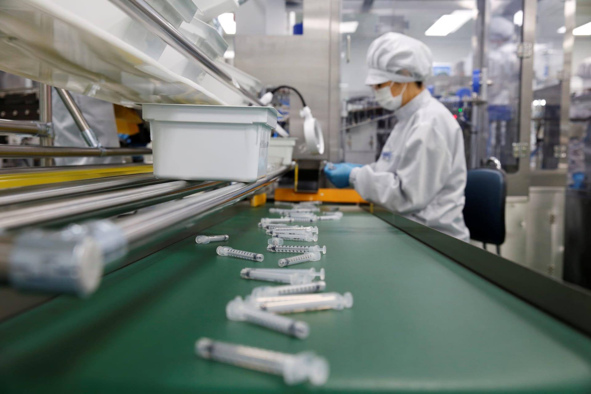 <p>An employee works at a syringe factory in Gunsan, South Korea, on April 5, 2021. </p>
