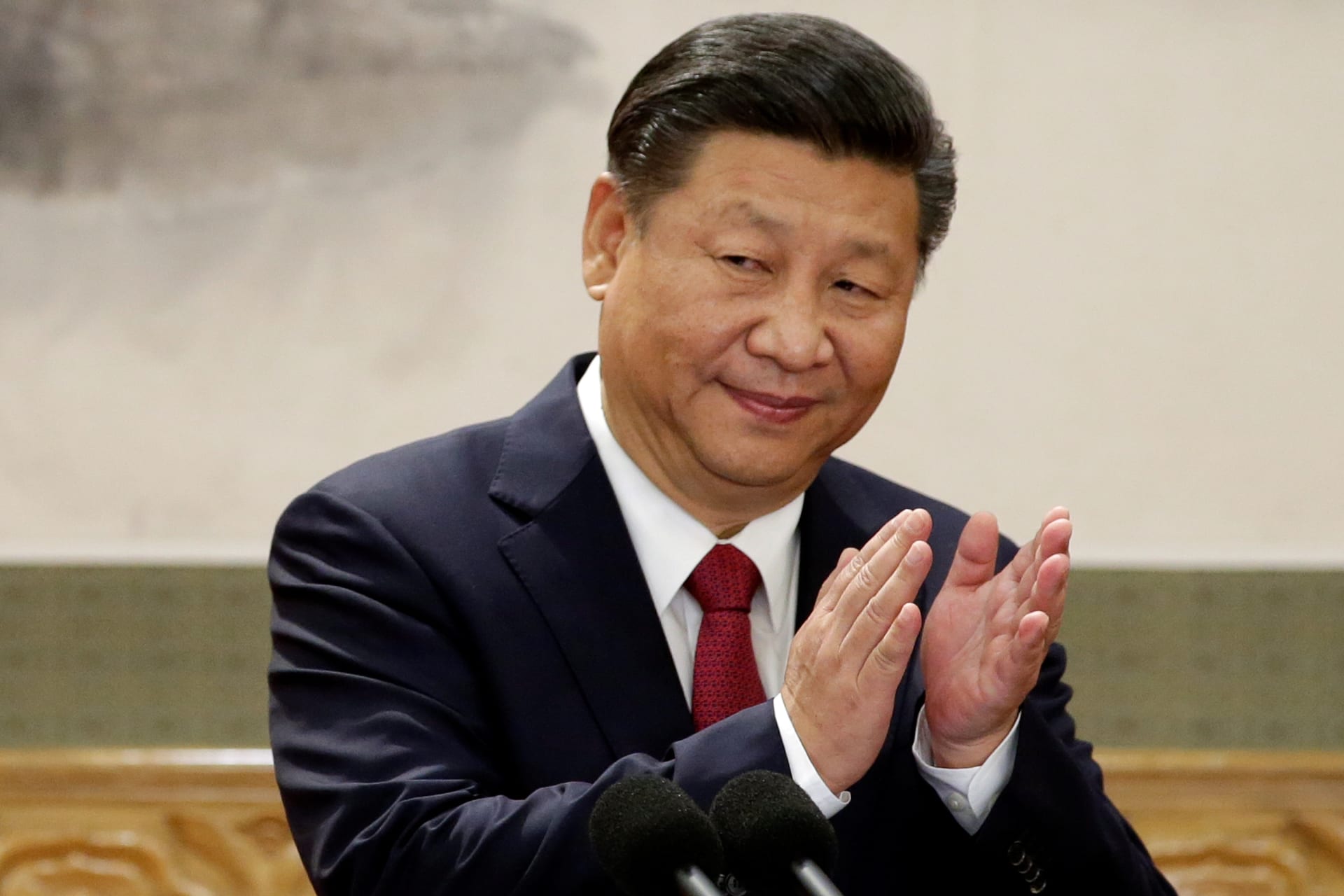 <p>China’s President Xi Jinping claps after his speech.</p>
