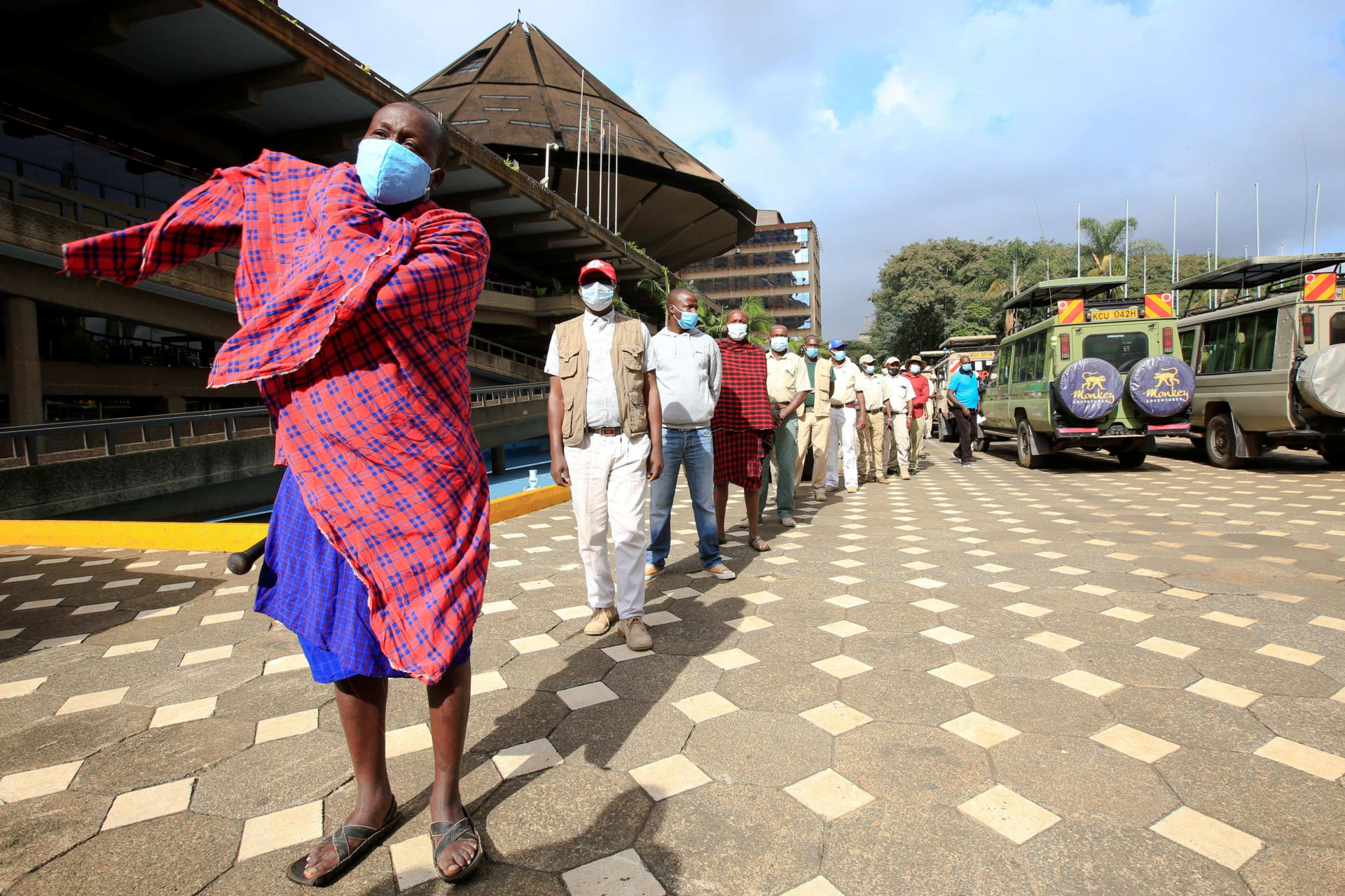 <p>Kenyan tour guides and travel operators queue to receive the AstraZeneca/Oxford vaccine against the coronavirus disease (COVID-19), under the COVAX scheme, in Nairobi, Kenya, April 27, 2021</p>
