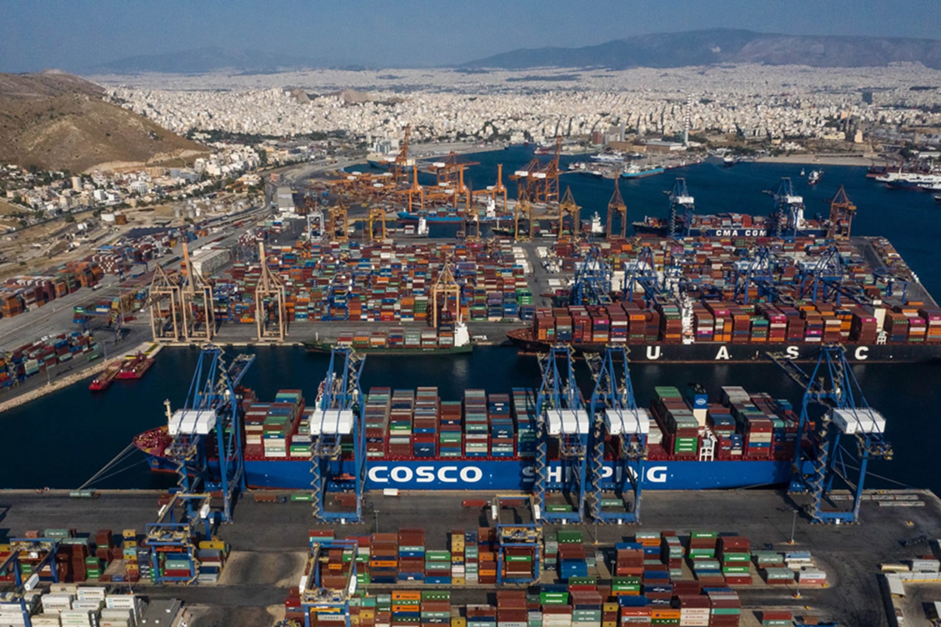 <p>Aerial photo taken on Sept. 6, 2019, shows a cargo ship of COSCO Shipping Lines at the Port of Piraeus in Greece. </p>
