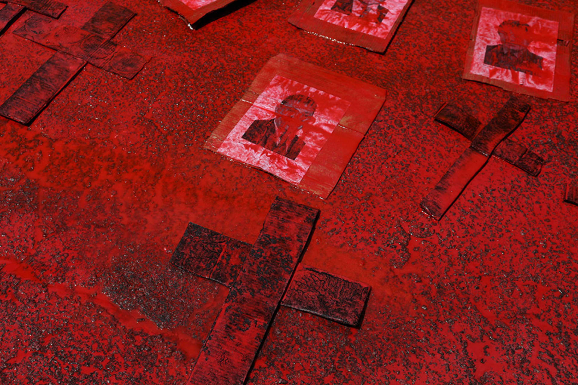 <p>Crosses and posters showing politicians are covered in red ink during a protest against Brazilian President Jair Bolsonaro’s handling of the COVID-19 outbreak.</p>
