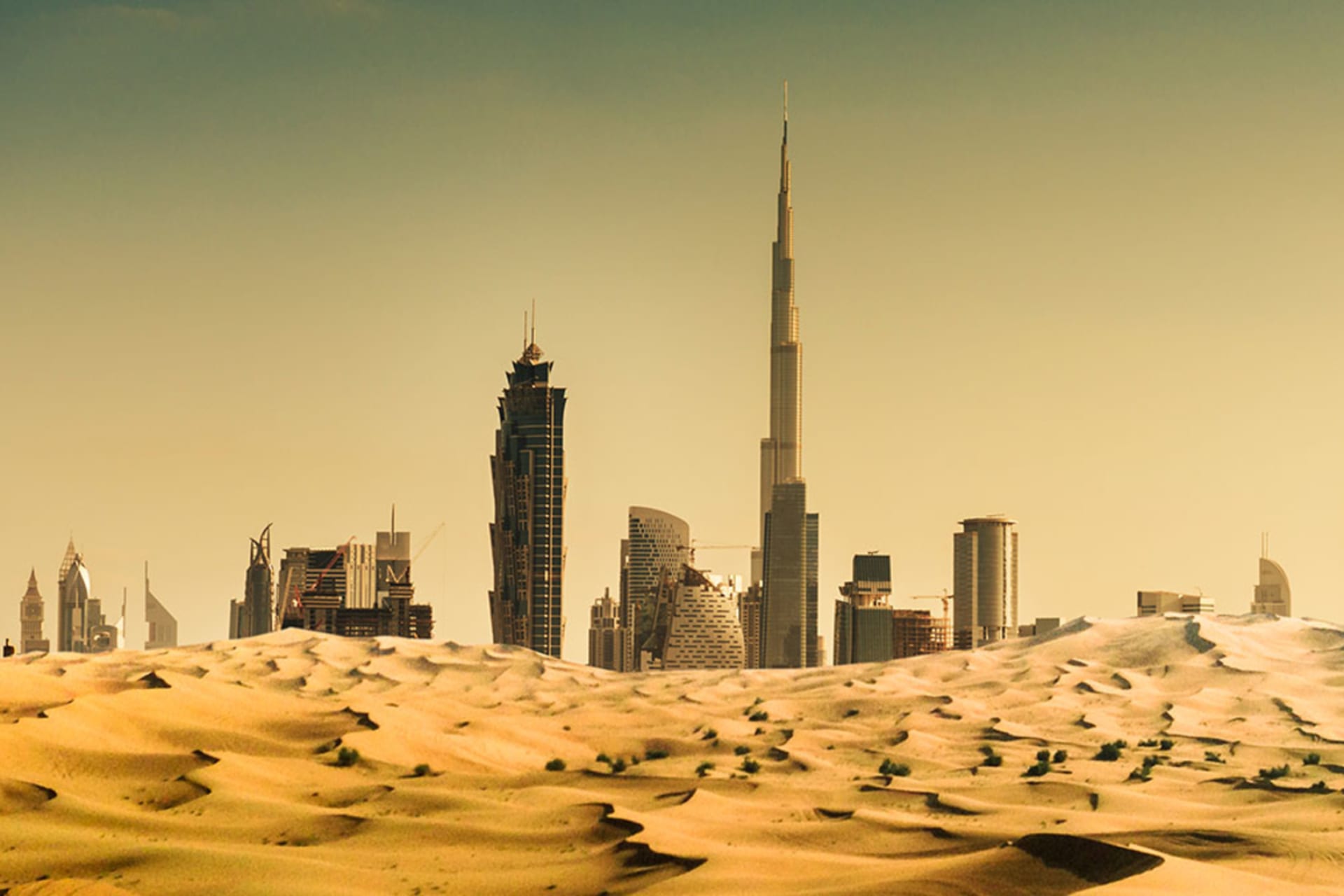 <p>The skyline of Dubai, United Arab Emirates, is seen from the desert.</p>
