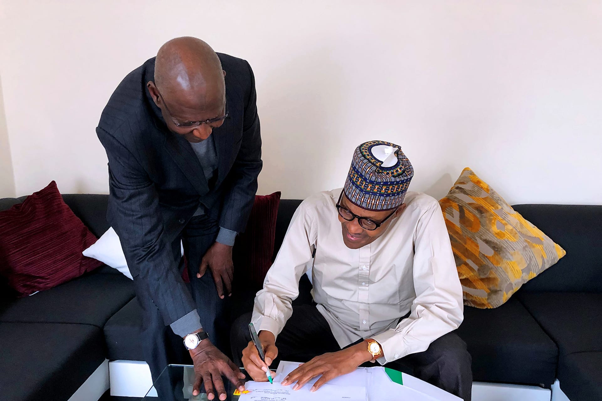 <p>Nigeria’s President Muhammadu Buhari signs into law a bill that amends legislation on agreements related to offshore oil production in Nigeria on November 4, 2019.</p>
