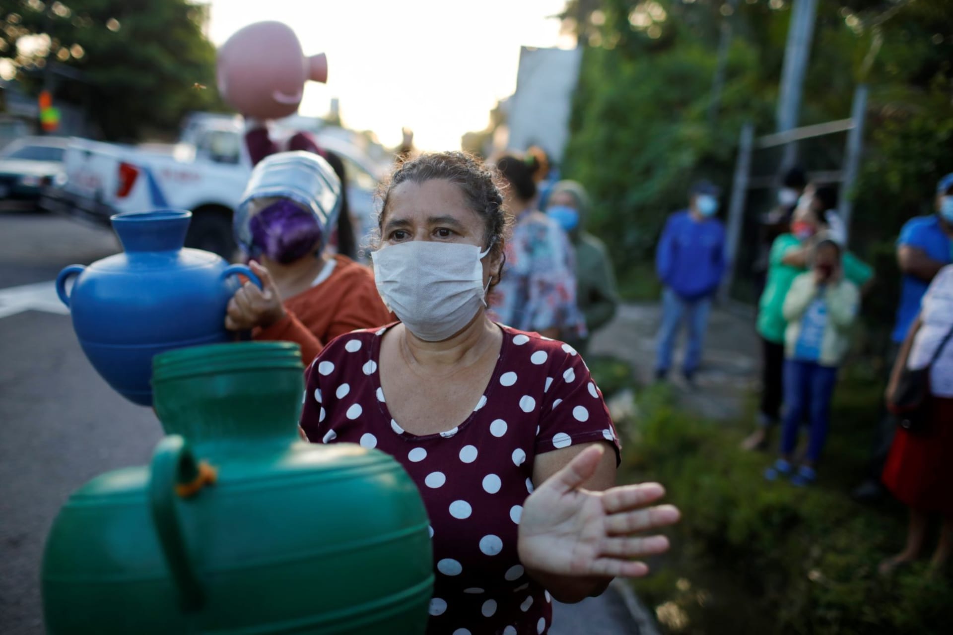 <p>Women protest the lack of water in San Martin, El Salvador, during the COVID-19 pandemic. </p>
