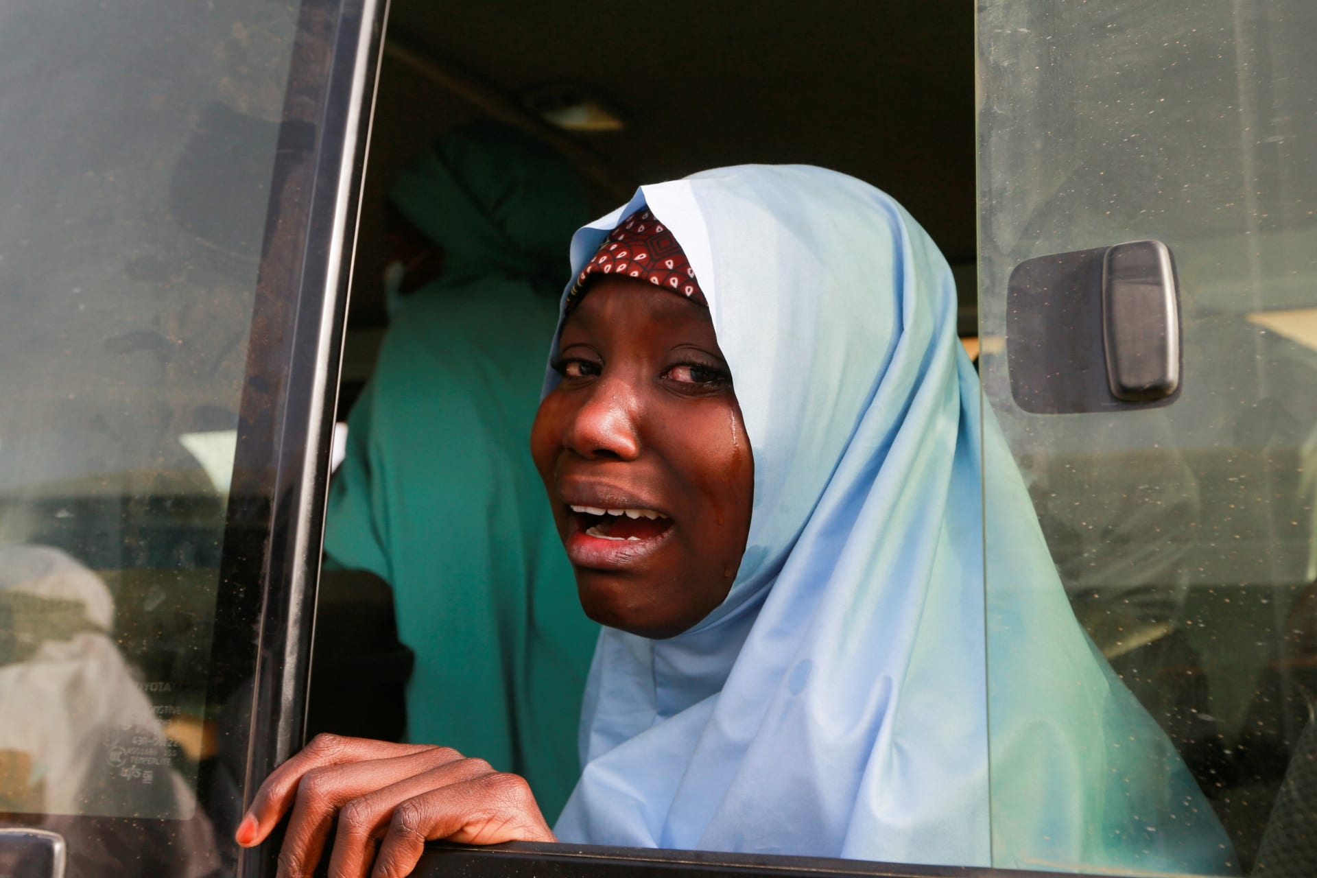 <p>A rescued JSS Jangebe schoolgirl reacts after arriving in Jangebe, Zamfara State, Nigeria on March 3, 2021.</p>
