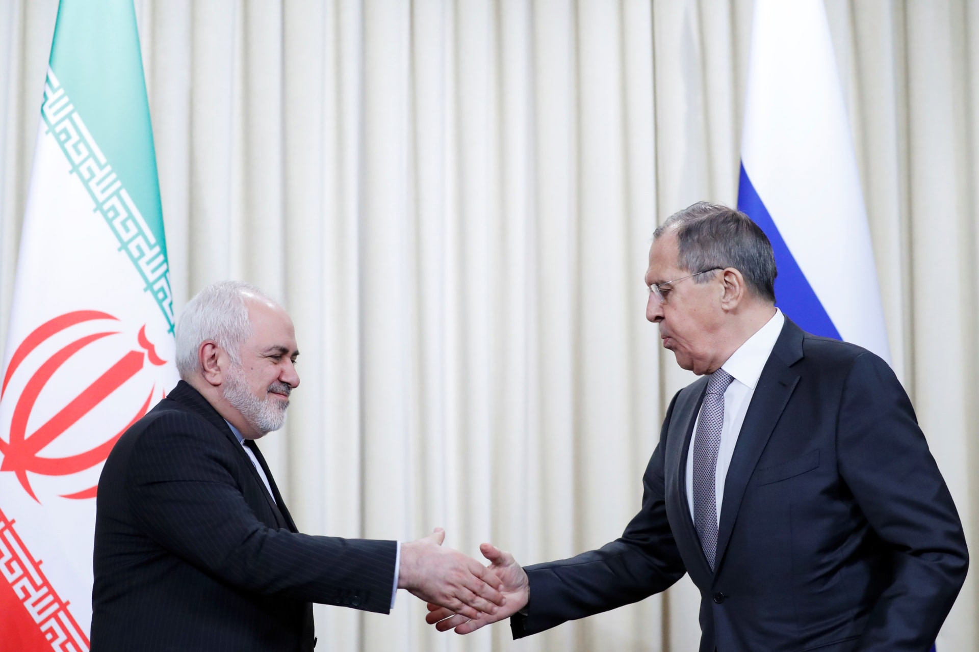 <p>Iran’s Foreign Minister Mohammad Javad Zarif shakes hands with Russia’s Foreign Minister Sergei Lavrov.</p>
