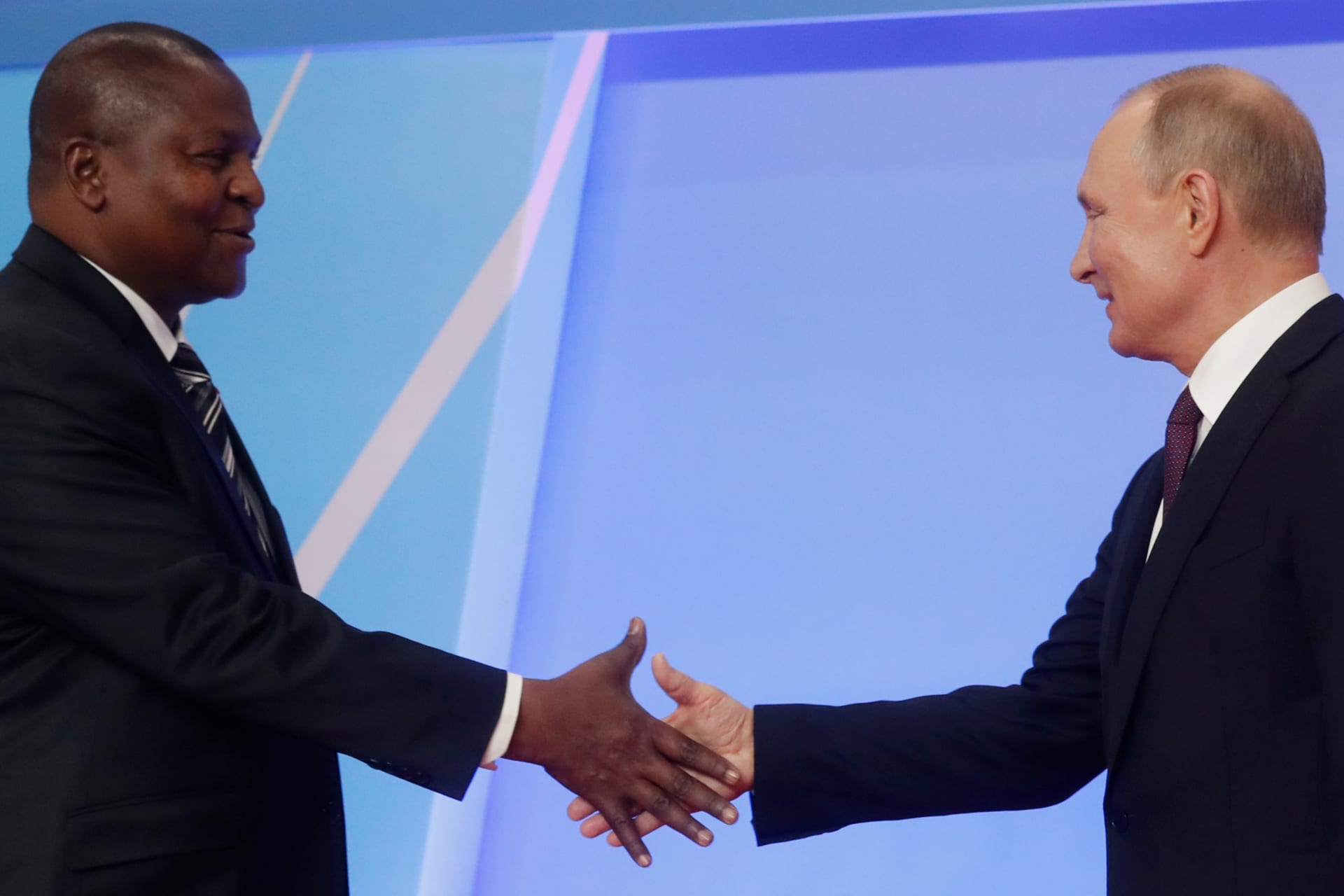 <p>Russian President Vladimir Putin shakes hands with Central African Republic President Faustin Touadera during a welcome ceremony for heads of state and government at the Russia-Africa Summit in the Black Sea resort of Sochi, Russia on October 23, 2019.</p>
