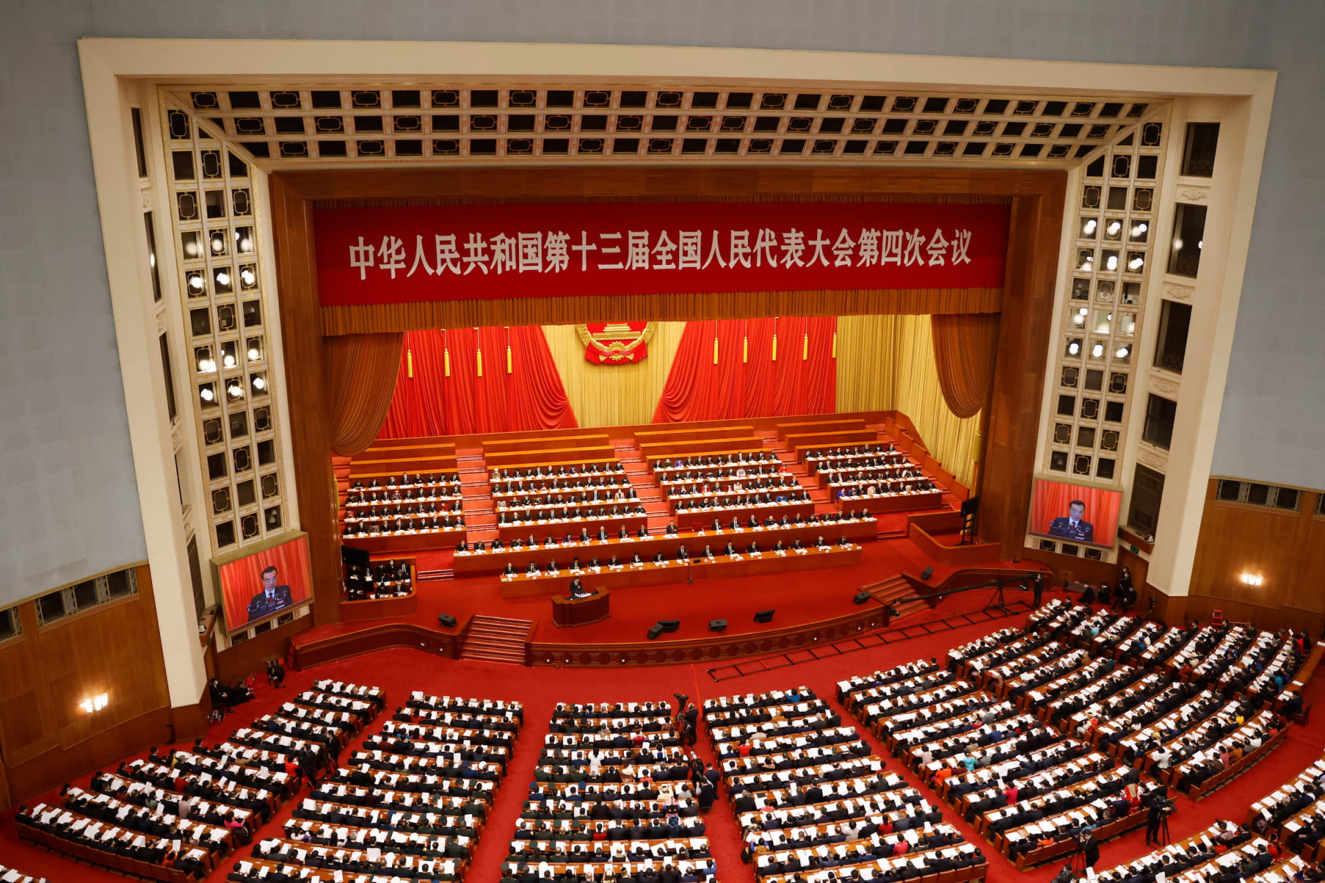 <p>Chinese Premier Li Keqiang speaks at the opening session of the National People’s Congress (NPC) at the Great Hall of the People in Beijing, China March 5, 2021.</p>
