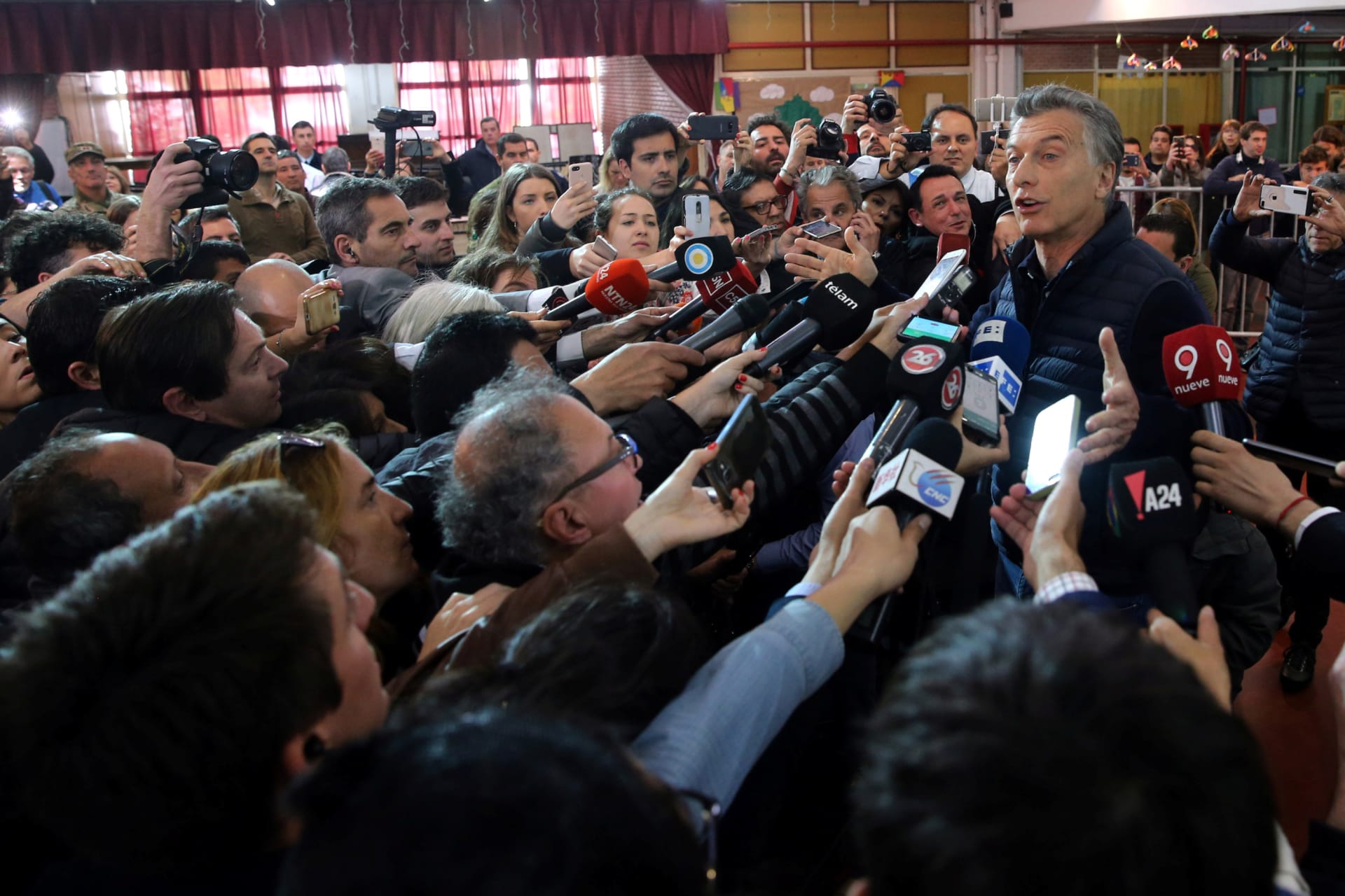 <p>Then-President Mauricio Macri of Argentina speaks to journalists after casting his vote in Buenos Aires.</p>
