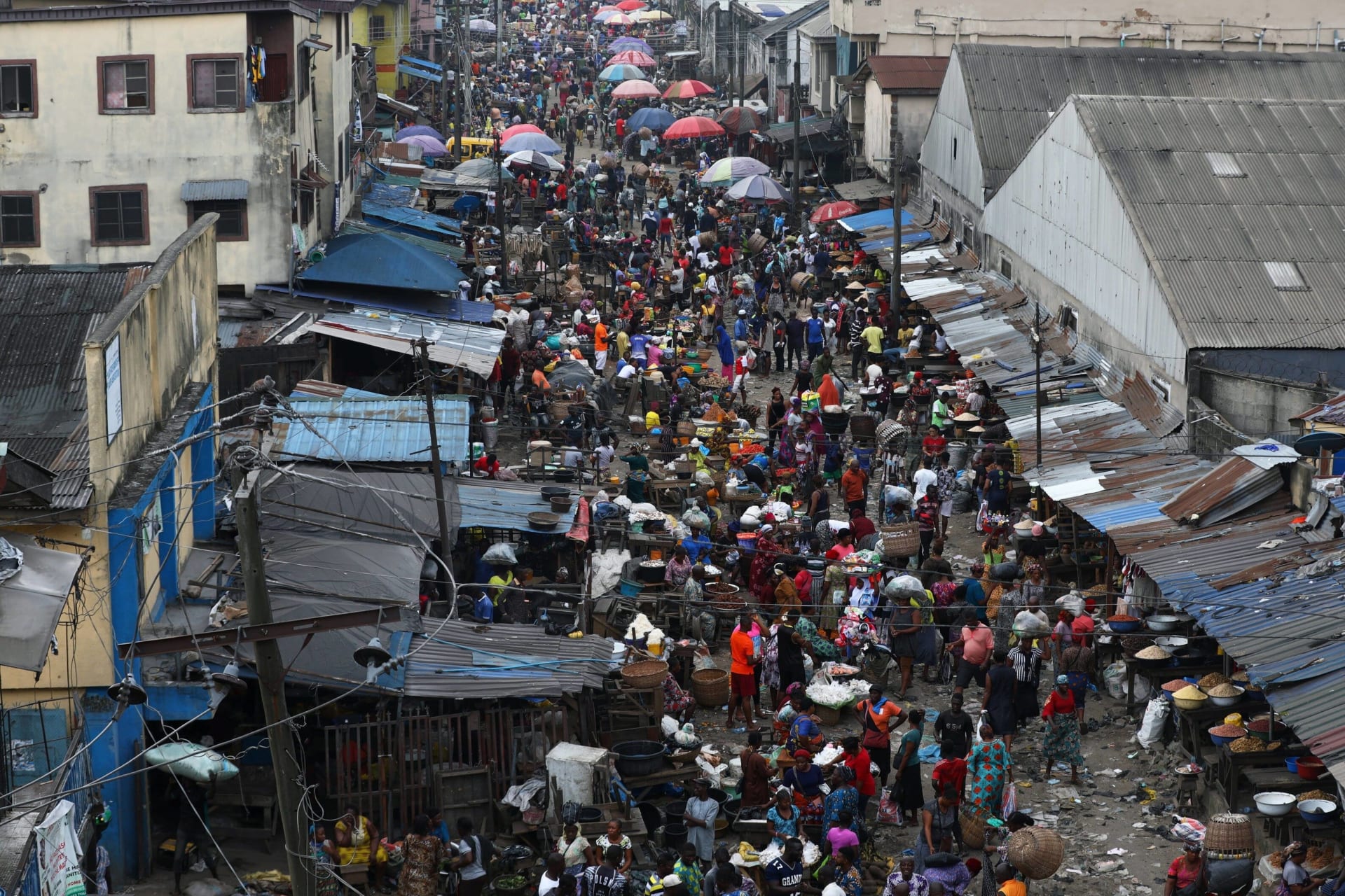 <p>Shoppers crowd at a market place in Lagos, Nigeria on October 24, 2020.</p>
