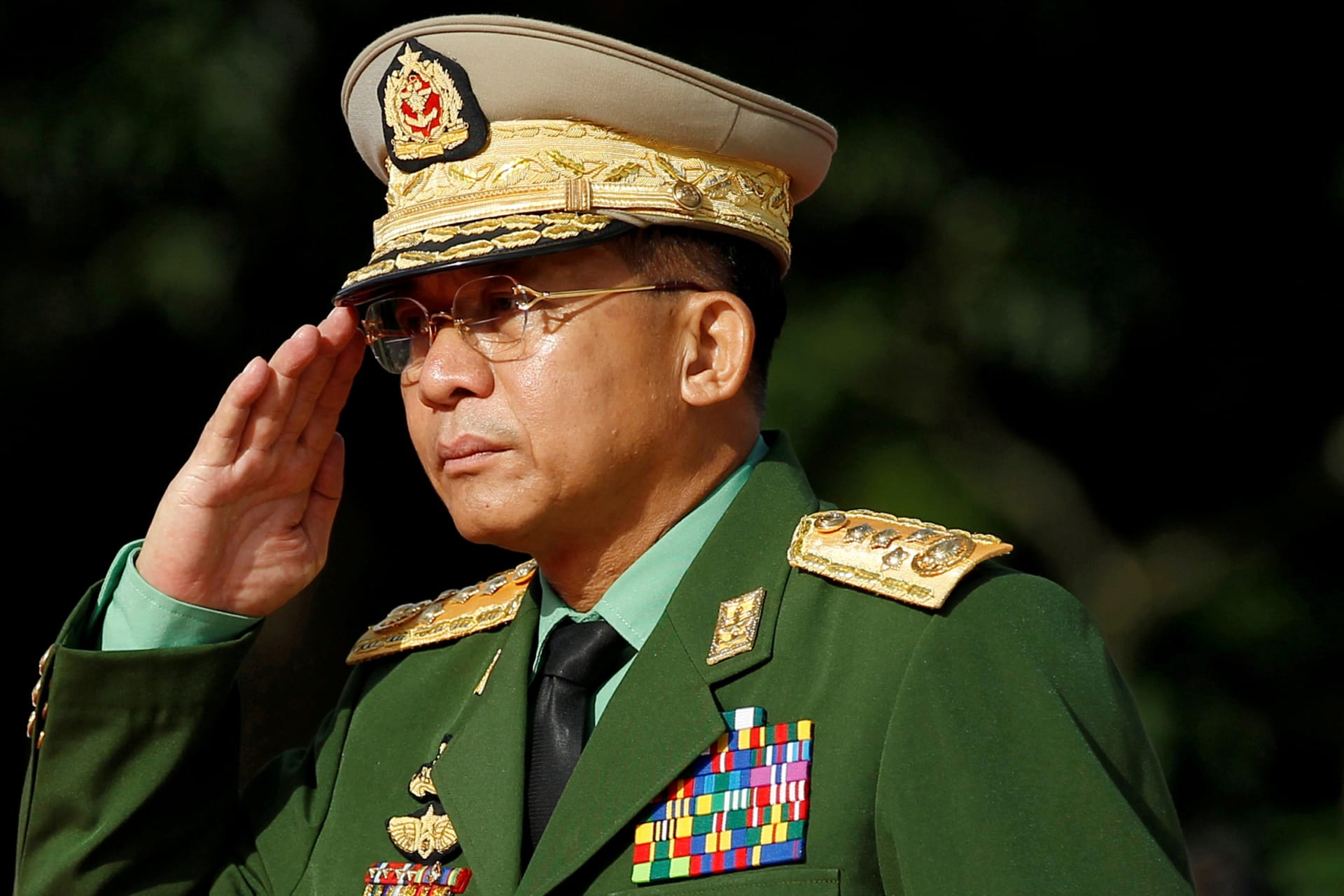 <p>Myanmar Commander in Chief Senior General Min Aung Hlaing salutes as he attends an event marking the anniversary of Martyrs’ Day at the Martyrs’ Mausoleum in Yangon on July 19, 2016.</p>
