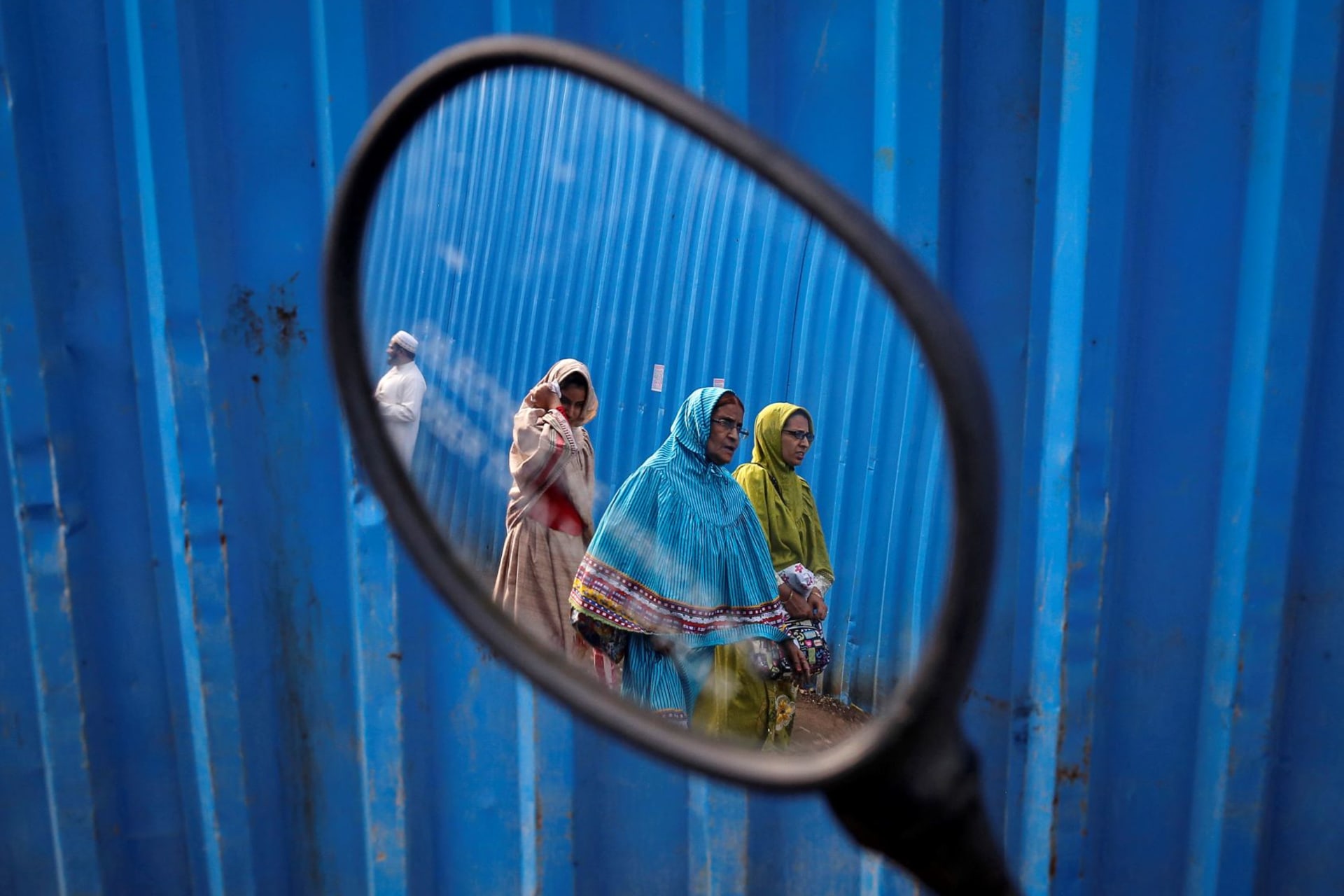 <p>Dawoodi Bohra women walk past a construction site in Mumbai. Dawoodi Bohras, including survivors, have begun speaking out against Female Genital Mutilation in their communities. </p>
