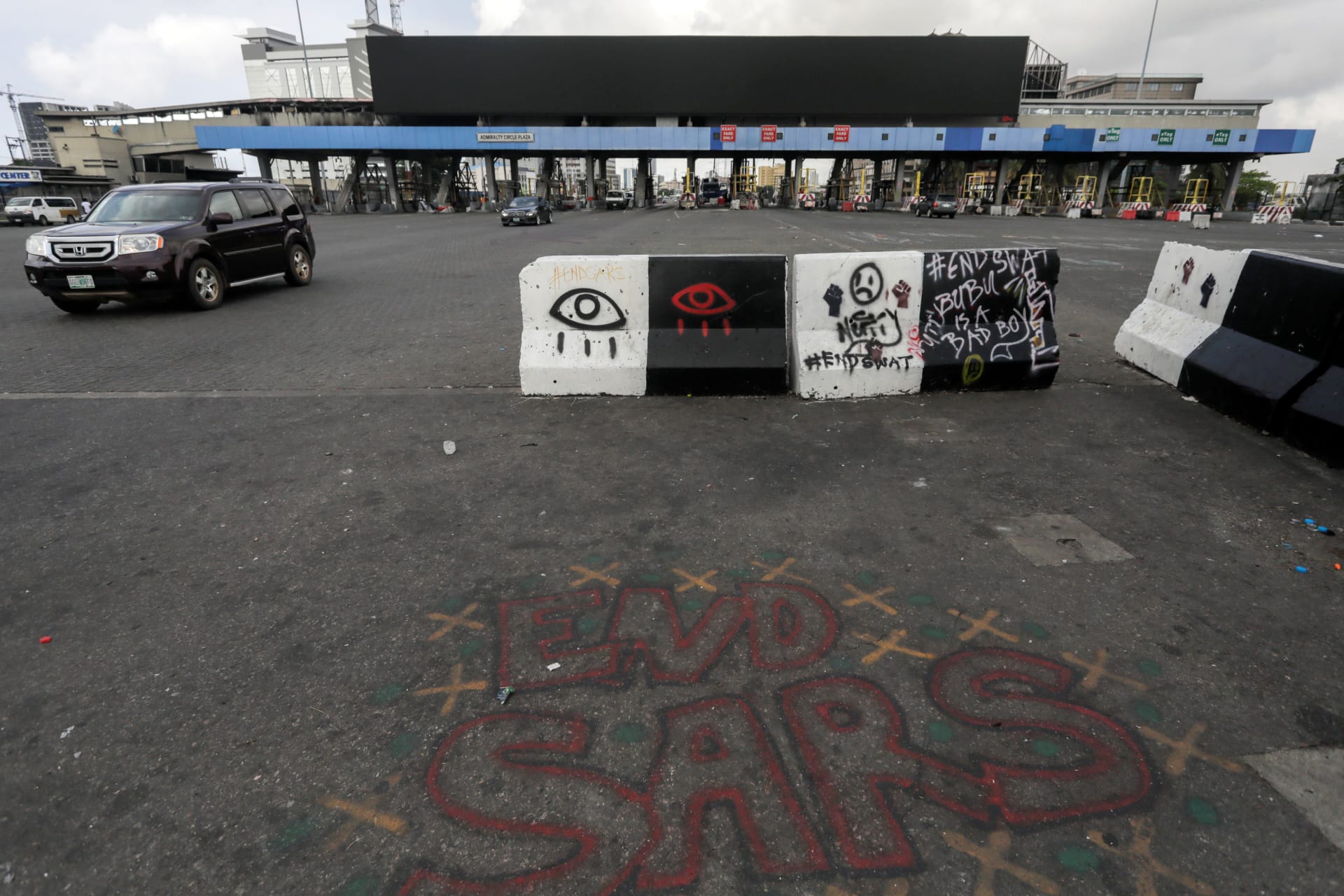 <p>Words ‘End Sars’, referring to the Special Anti-Robbery Squad police unit, are written near the Lekki toll gate, in Lagos, Nigeria on October 24, 2020.</p>
