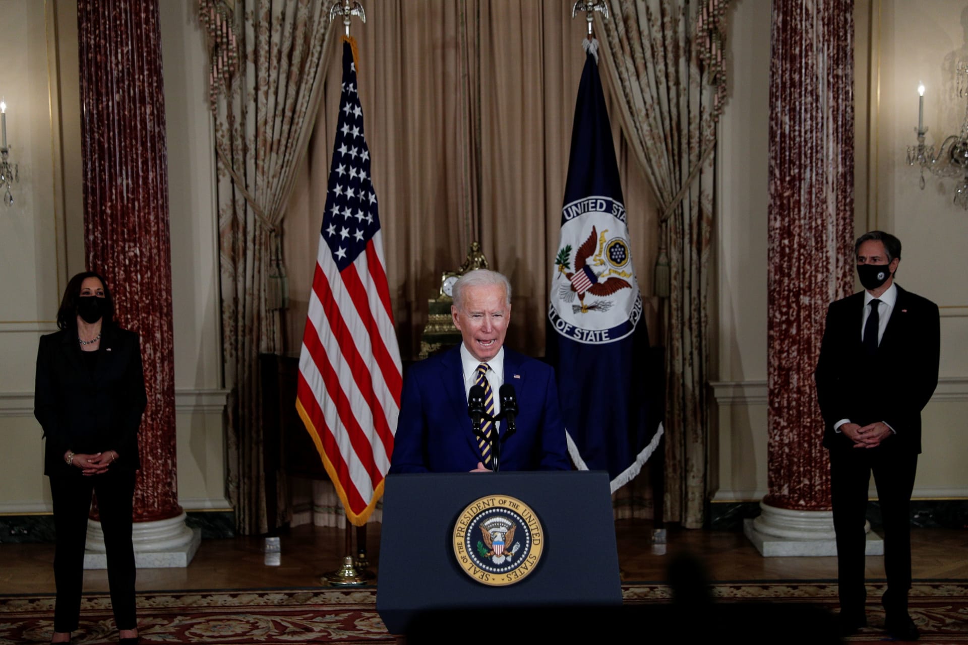 <p>U.S. President Joe Biden delivers a foreign policy address as Vice President Kamala Harris and Secretary of State Antony Blinken listen during a visit to the State Department.</p>
