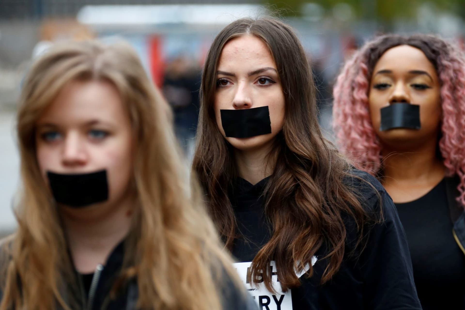 <p>Women attend a protest against human trafficking in Berlin. </p>

