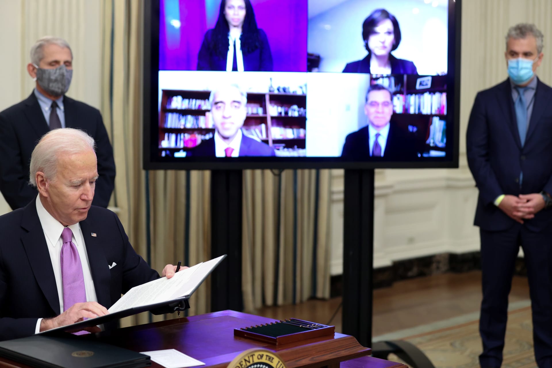 <p>U.S. President Joe Biden signs an executive order.</p>
