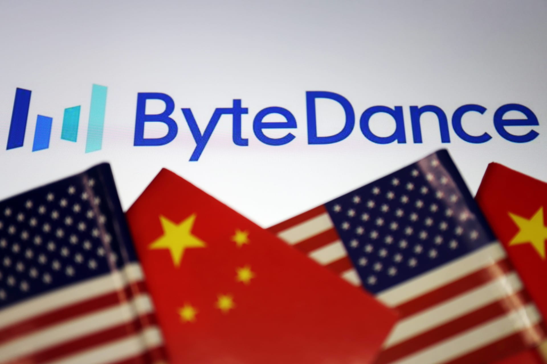 <p>Flags of China and U.S. are seen near a ByteDance logo.</p>
