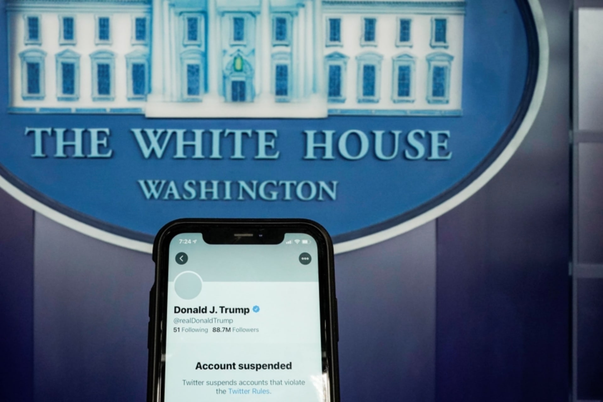 <p>A photo illustration shows the suspended Twitter account of U.S. President Donald Trump on a smartphone at the White House briefing room in Washington, D.C. on January 8, 2021.</p>
