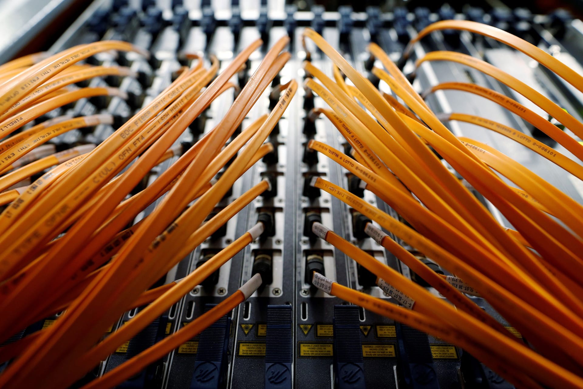 <p>Optical fibre cables are seen in a telephone exchange.</p>
