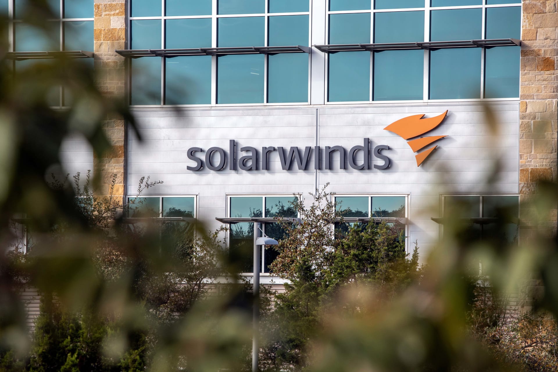 <p>The SolarWinds logo is seen outside its headquarters.</p>

