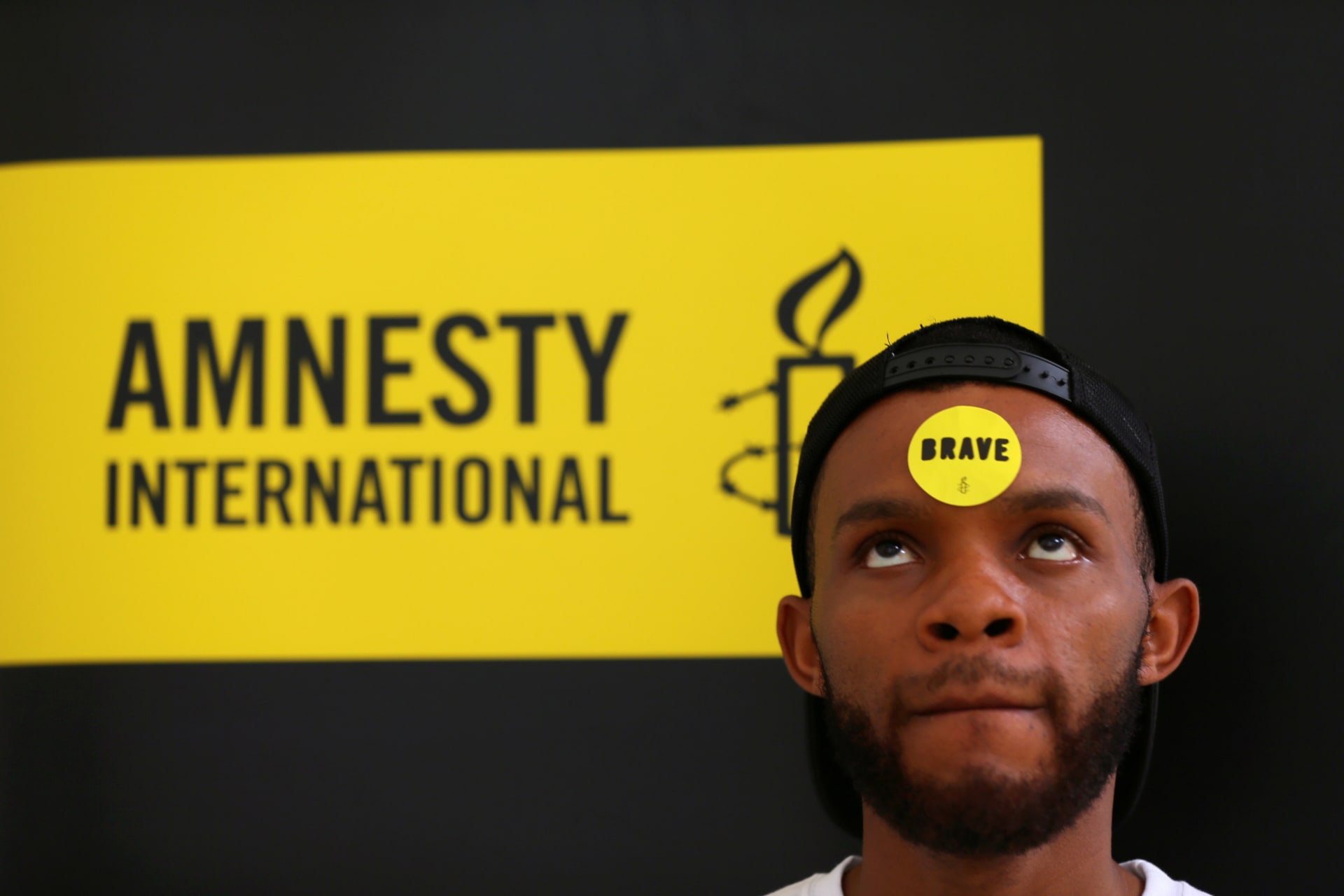 <p>Human rights campaigner looks on during the release of an Amnesty International report in Abuja, Nigeria on May 16, 2017.</p>
