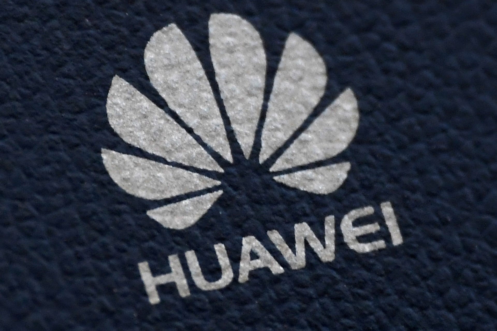 <p>The Huawei logo is seen on a communications device.</p>

