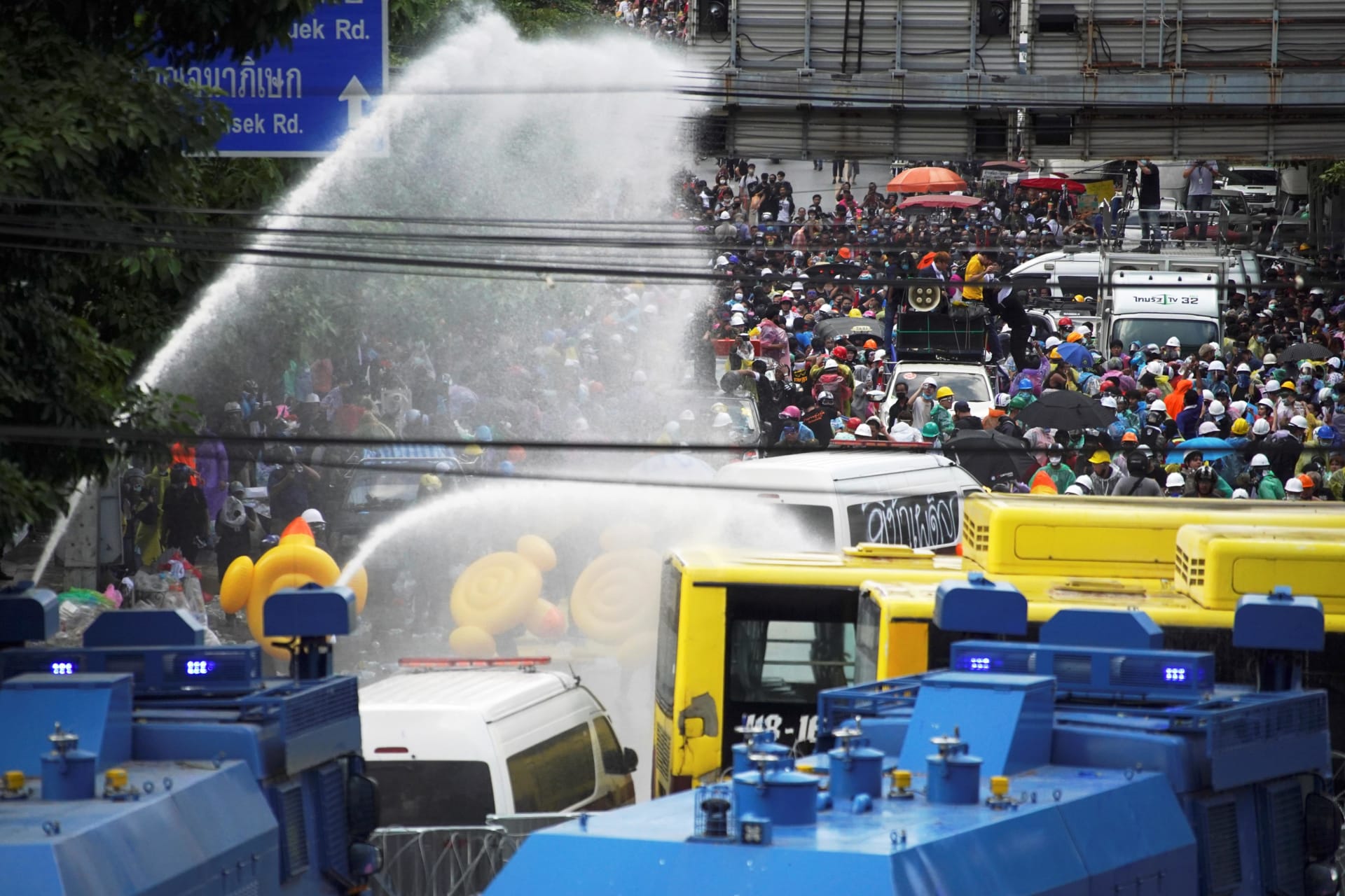<p>Demonstrators are seen as water cannons are being used during an anti-government protest as lawmakers debate on constitution change, outside the parliament in Bangkok, Thailand, on November 17, 2020.</p>