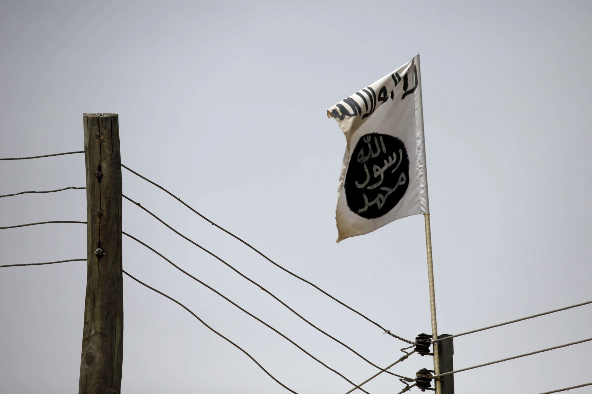 <p>A Boko Haram flag flies in Damasak, Nigeria on March 24, 2015.</p>
