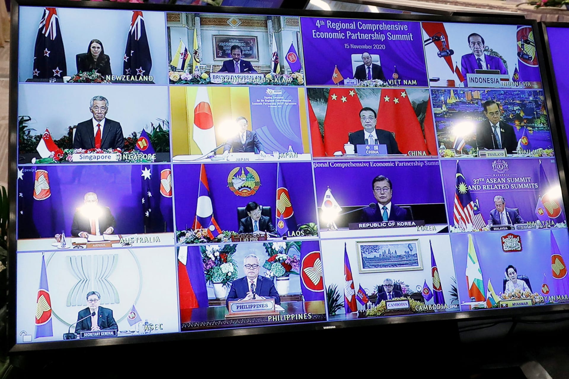 <p>ASEAN leaders are seen on a screen as they attend the 4th Regional Comprehensive Economic Partnership Summit as part of the 37th ASEAN Summit in Hanoi, Vietnam on November 15, 2020.</p>
