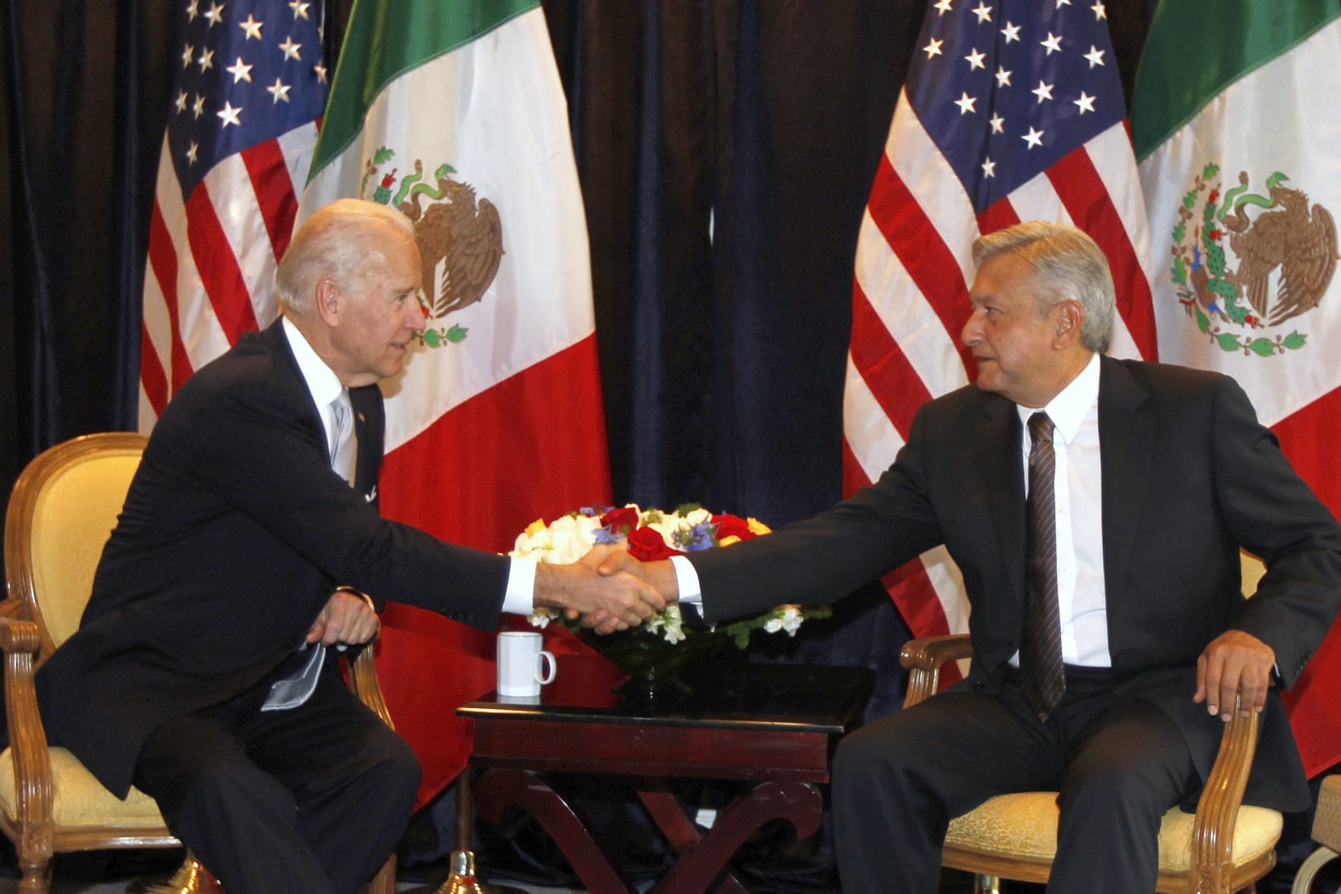 <p>U.S. Vice President Joseph Biden (L) shakes hands with Andres Manuel Lopez Obrador, presidential candidate for the Party of the Democratic Revolution (PRD) during a photo opportunity in Mexico City March 5, 2012. </p>
