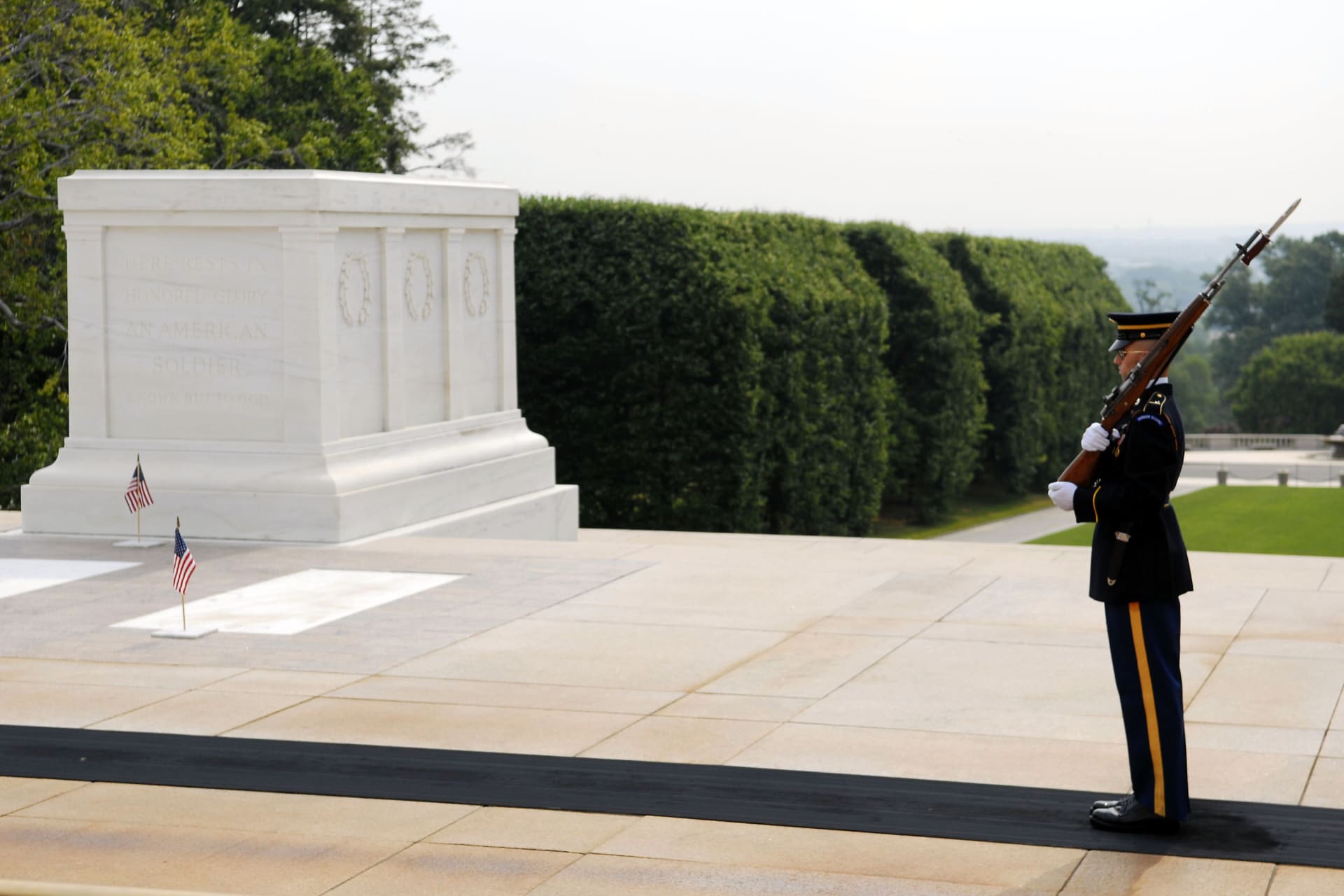 <p>A member of the U.S. Army Honor Guard watches over the Tomb of the Unknown Soldier at Arlington National Cemetery. Jonathan Ernst/Reuters</p>
