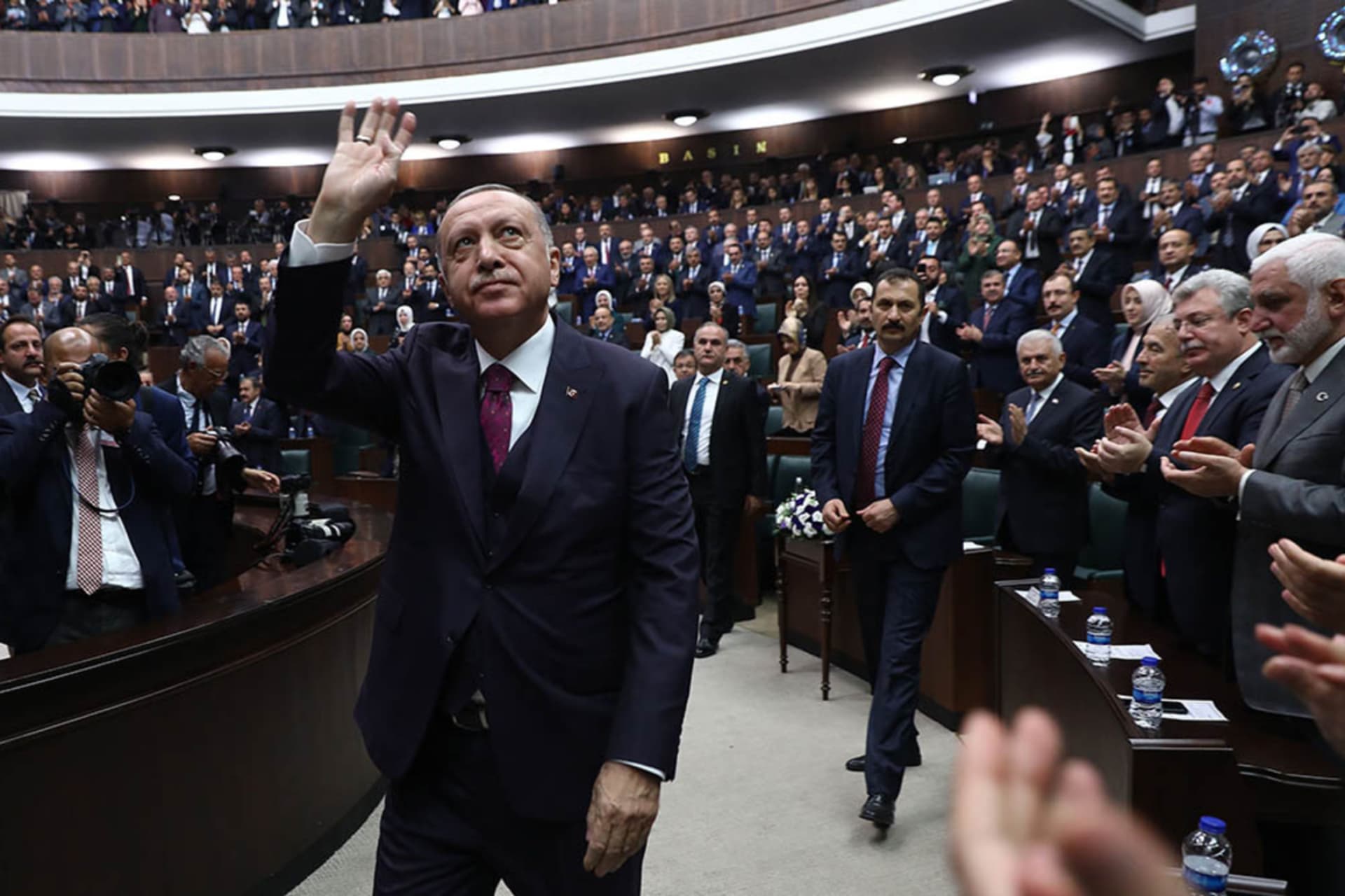 <p> Turkish President Recep Tayyip Erdogan waves to members of his party during a parliamentary group meeting at the Grand National Assembly of Turkey.</p>
