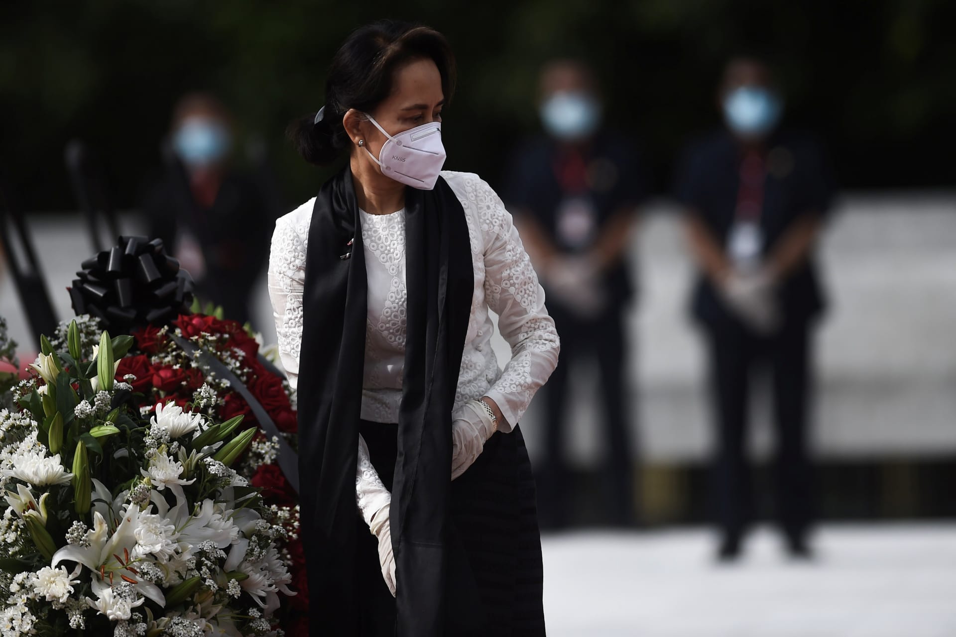 <p>Myanmar State Counsellor and Foreign Minister Aung San Suu Kyi leaves after paying her respects to her late father during a ceremony to mark the 73rd anniversary of Martyrs’ Day in Yangon on July 19, 2020.</p>
