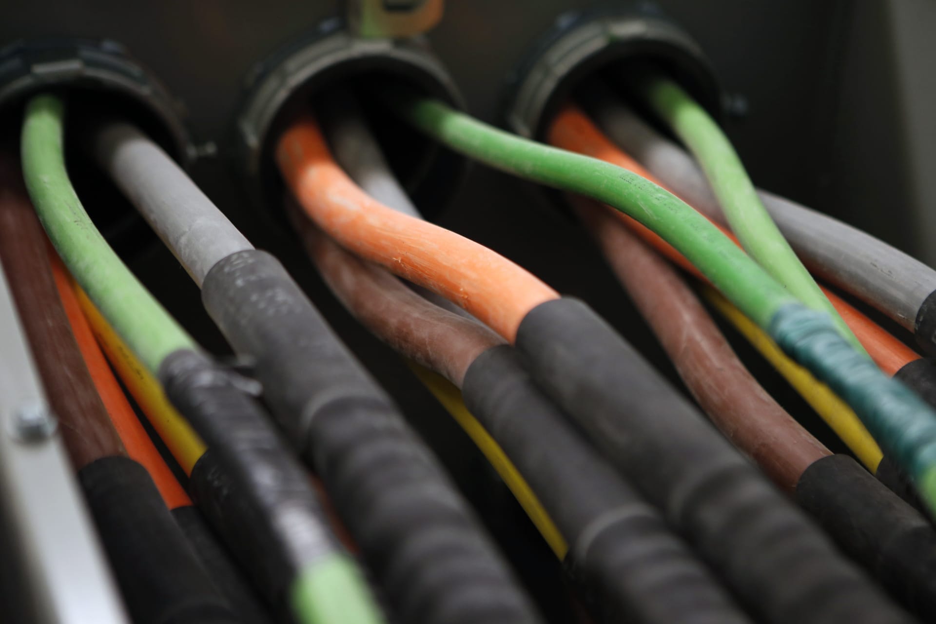 <p>Fiber optic cables carrying internet providers are seen running into a server room.</p>
