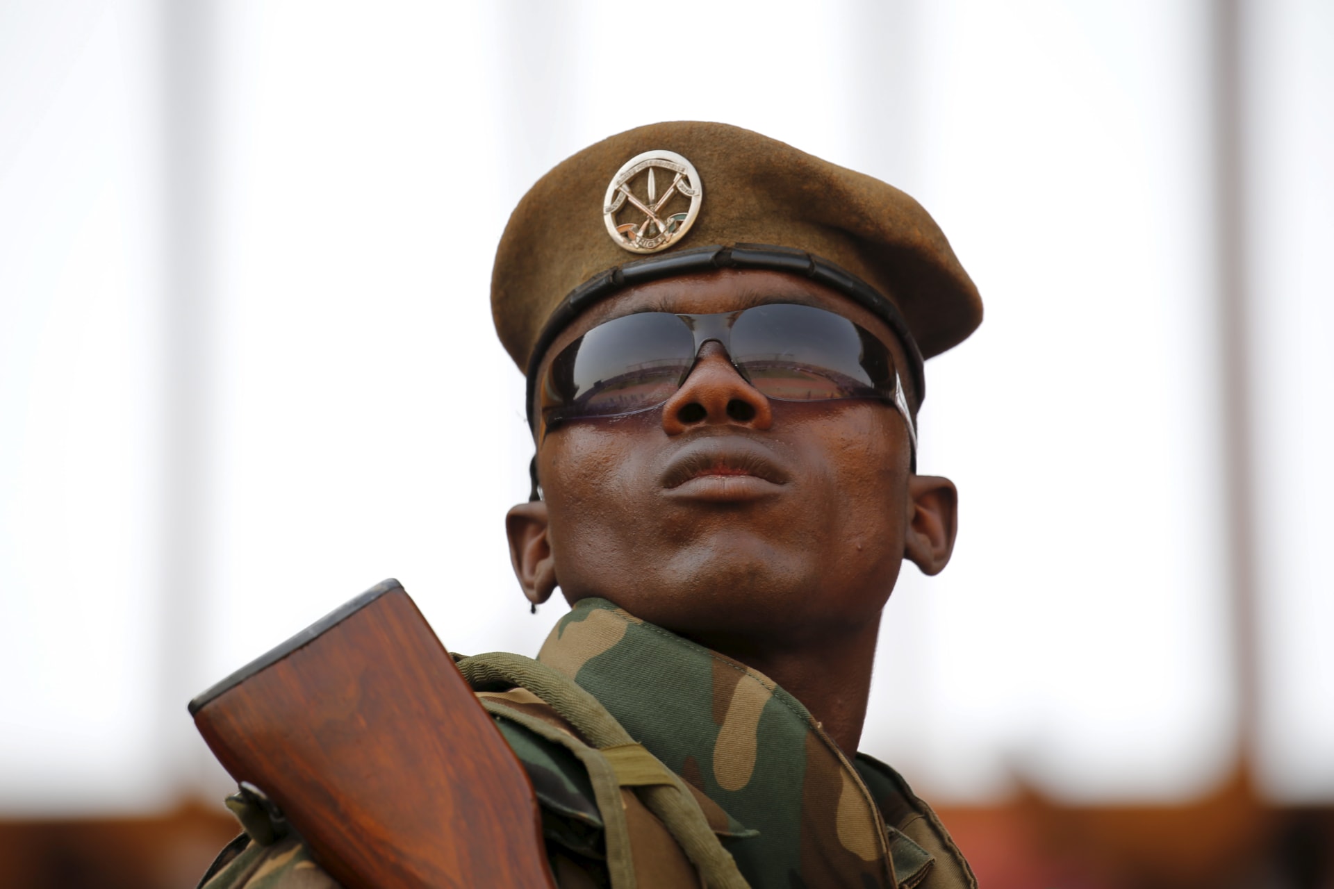 <p>A soldier stands guard at a campaign rally for incumbent President Mahamadou Issoufou in Niamey, Niger, on February 18, 2016.</p>
